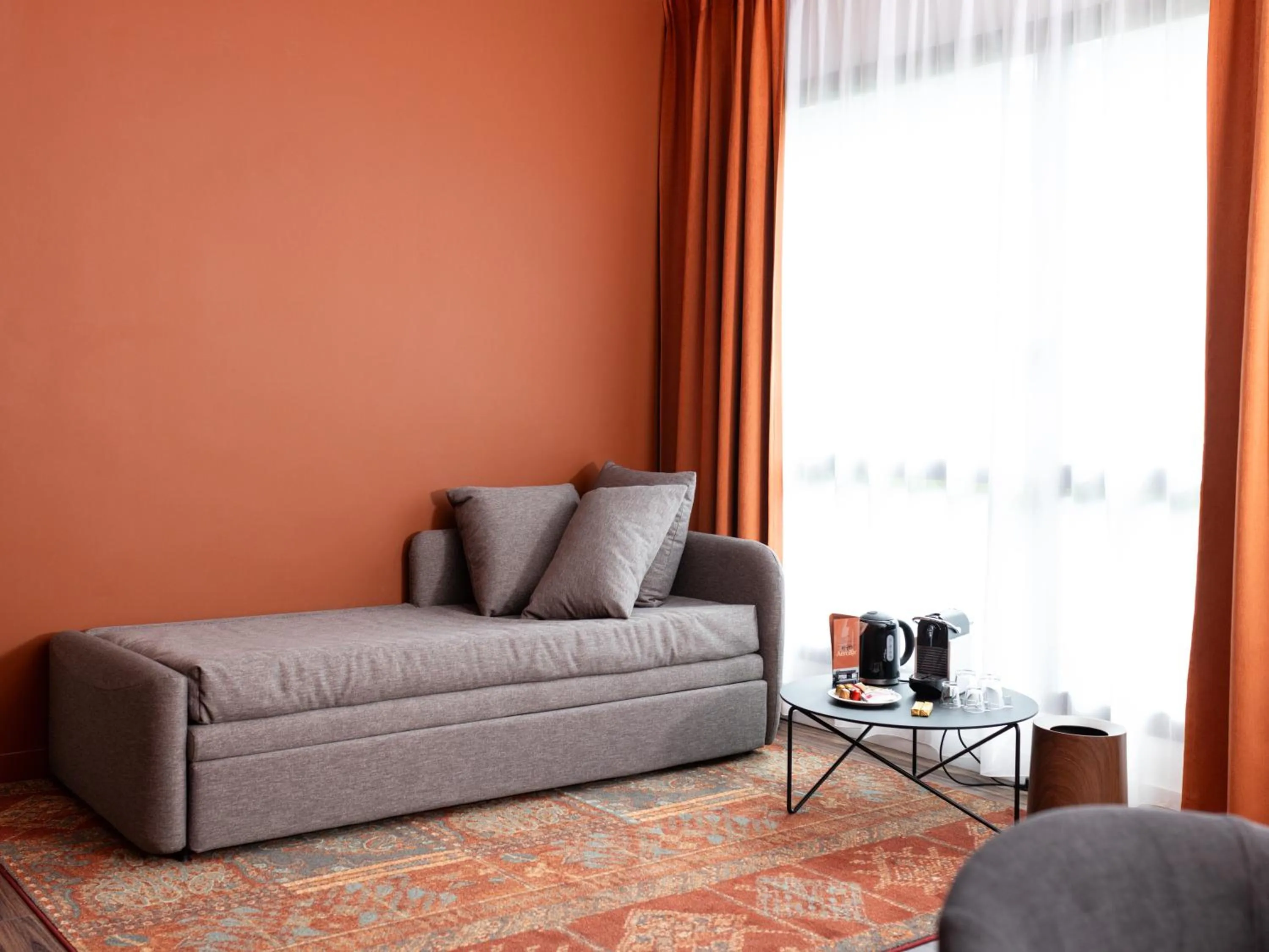 Living room in ibis Styles Lille Aéroport