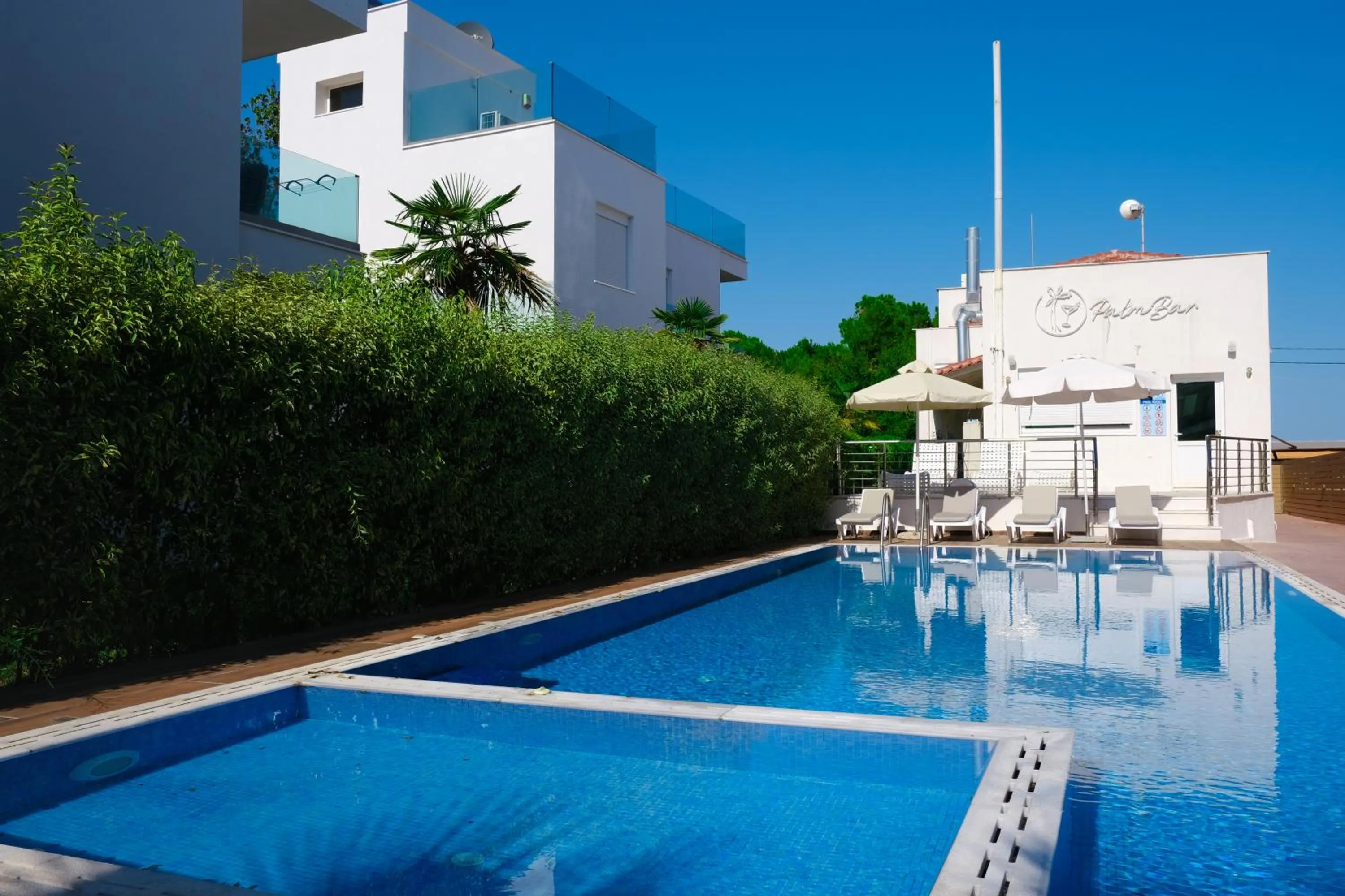 Swimming pool in Acrotel Porto Brava Luxury Villas