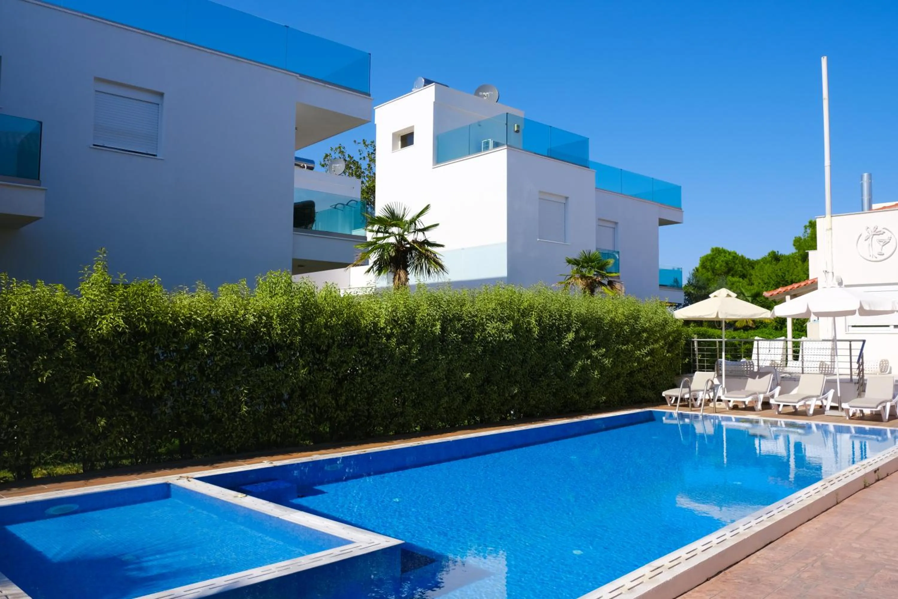 Swimming pool in Acrotel Porto Brava Luxury Villas