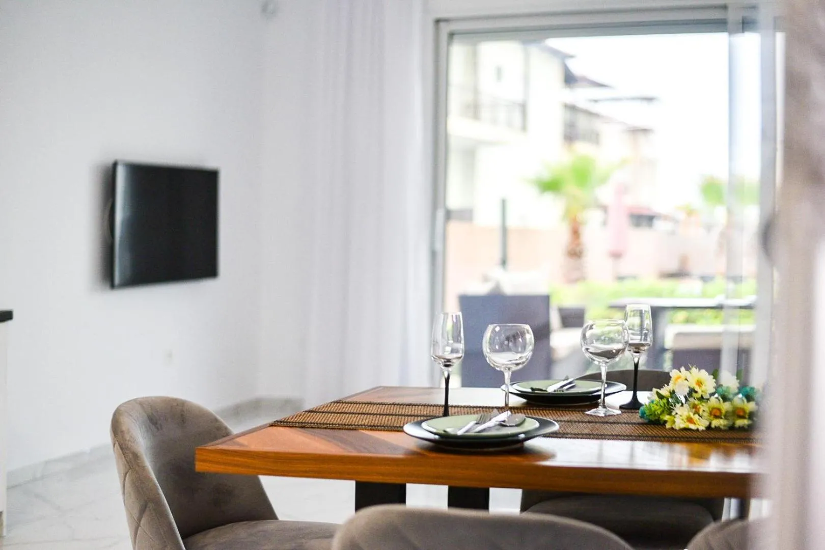 Communal lounge/ TV room in Acrotel Porto Brava Luxury Villas