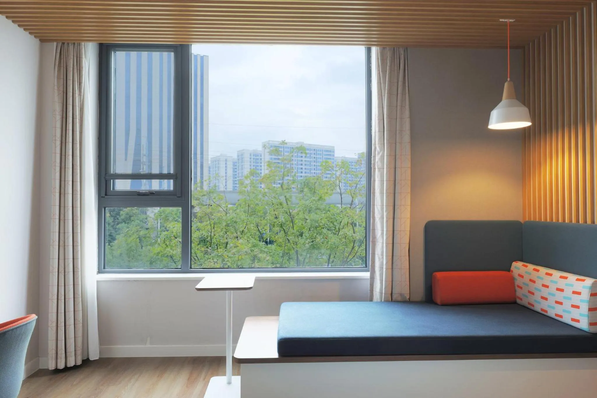 Photo of the whole room, Bed in Holiday Inn Express Shanghai Kangqiao by IHG