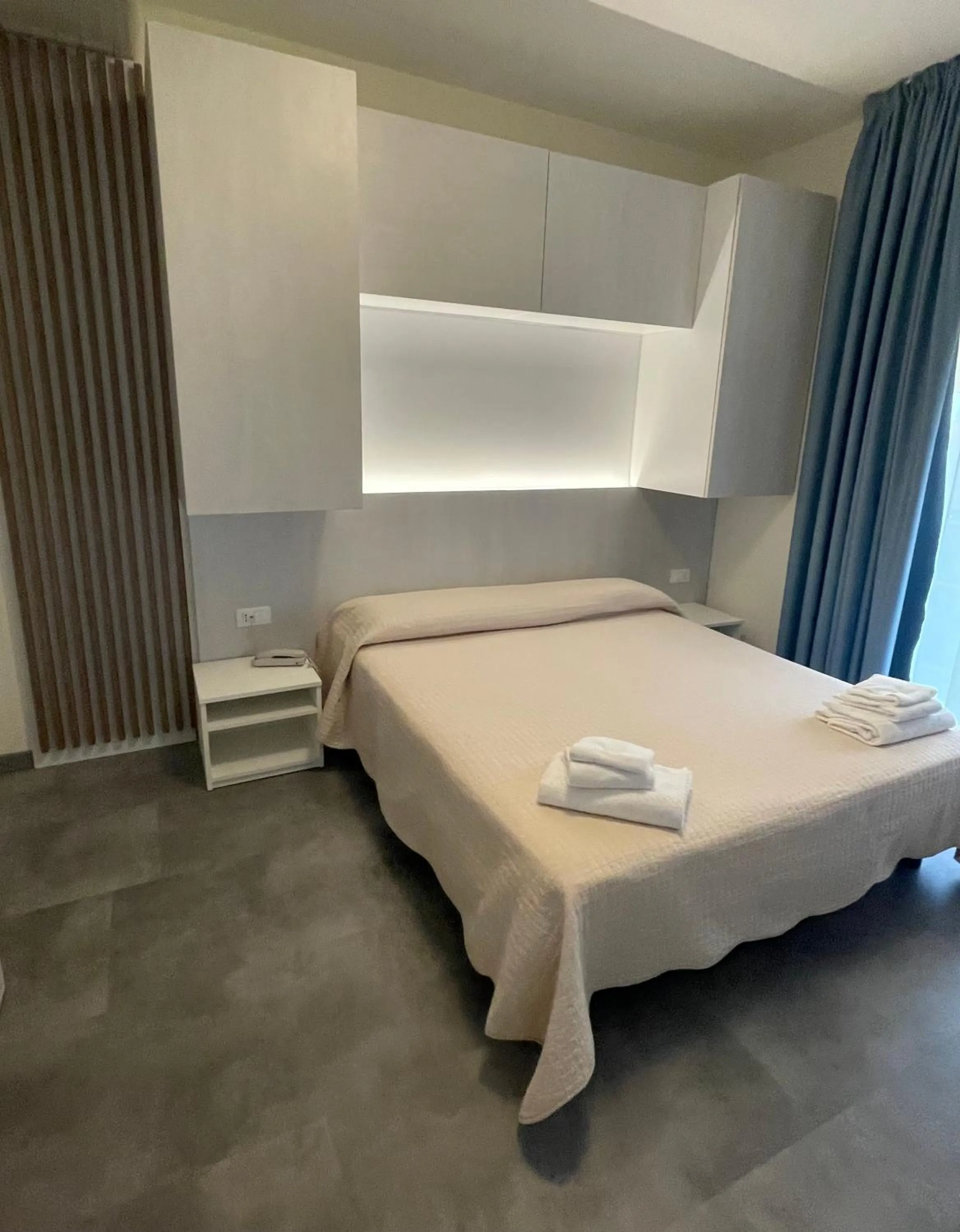 Bed in Hotel Catto Suisse