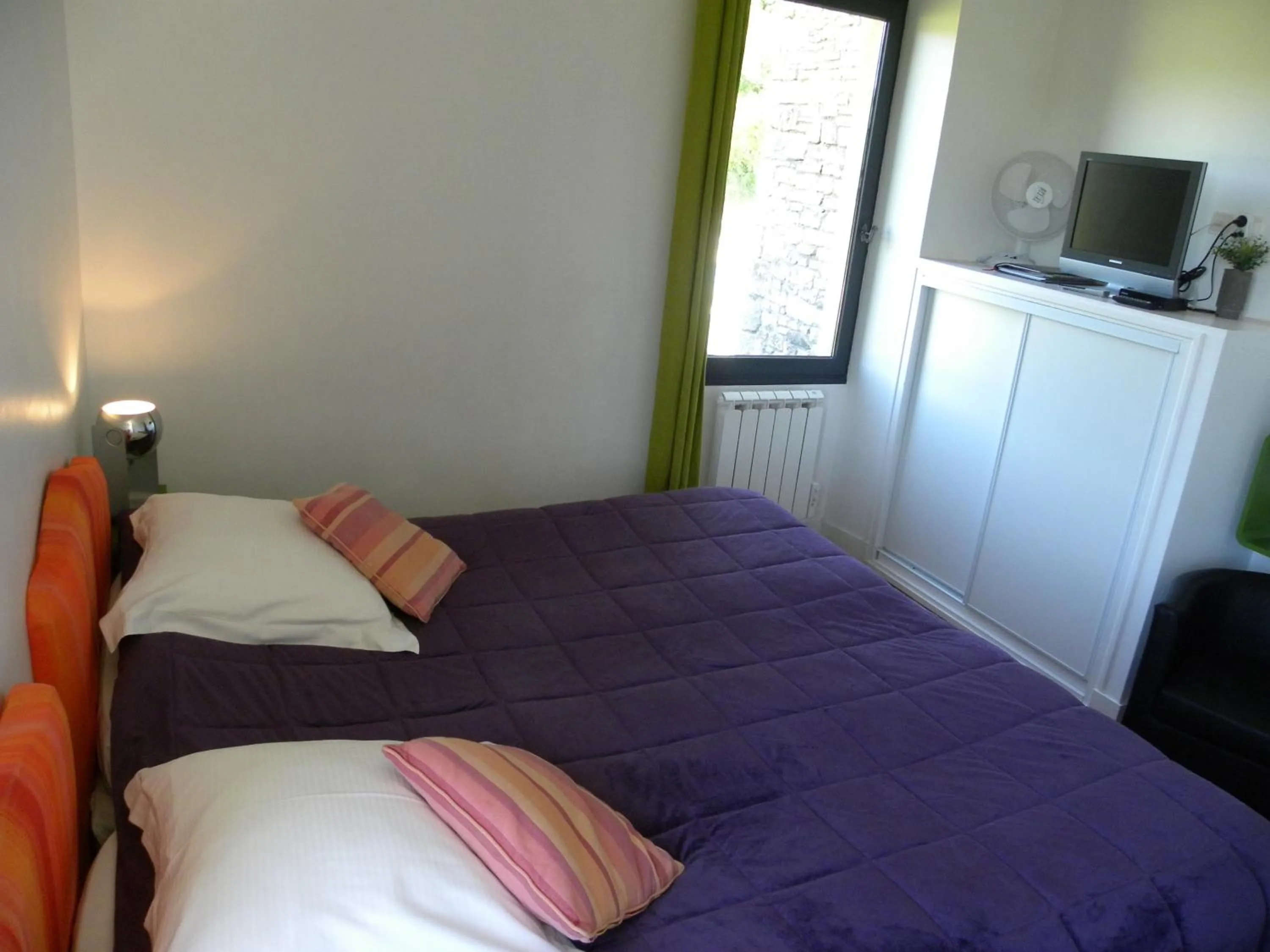 Bed in Hotel La Bastie d'Urfé