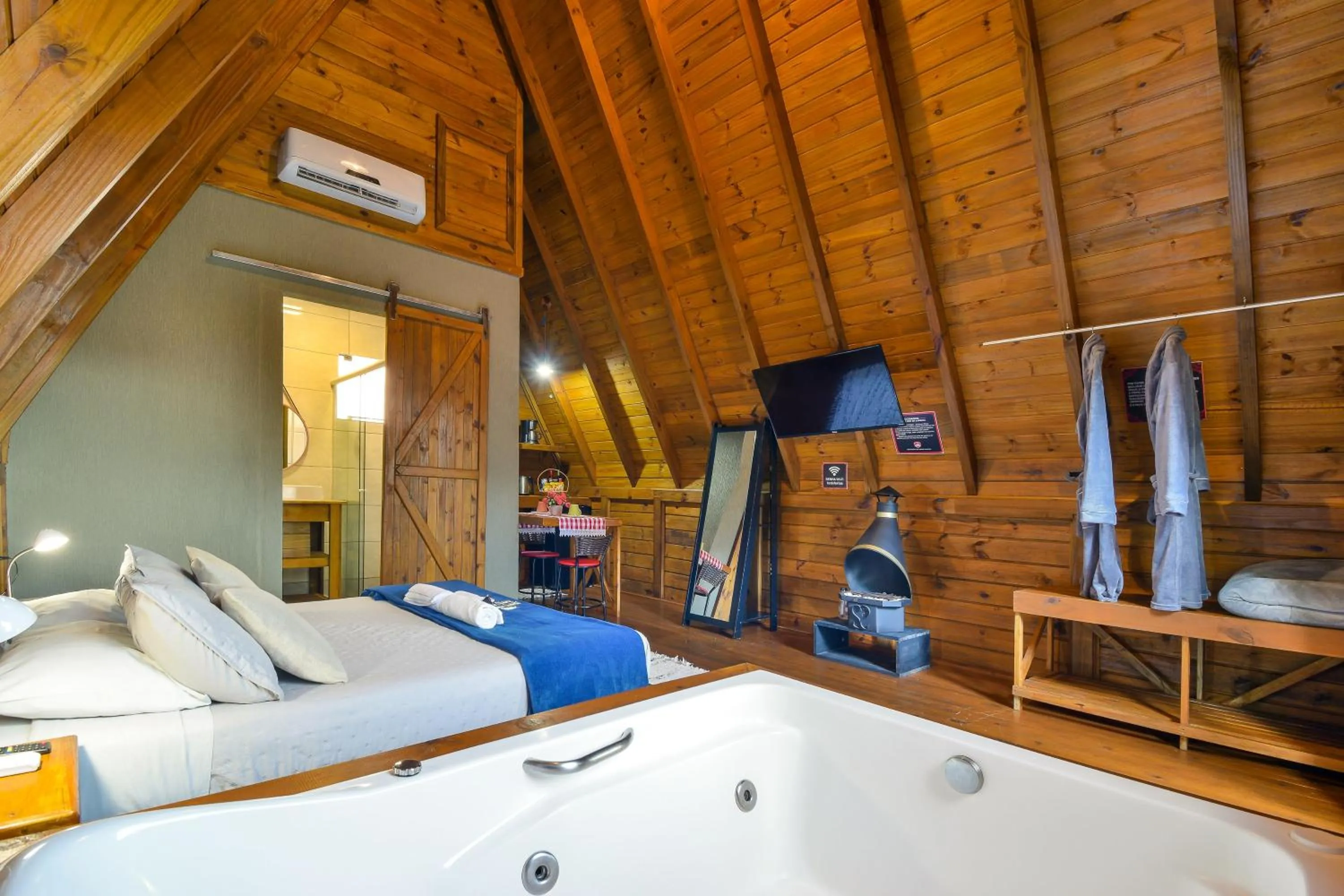 Bed in Pousada Chalé Suiço Bombinhas