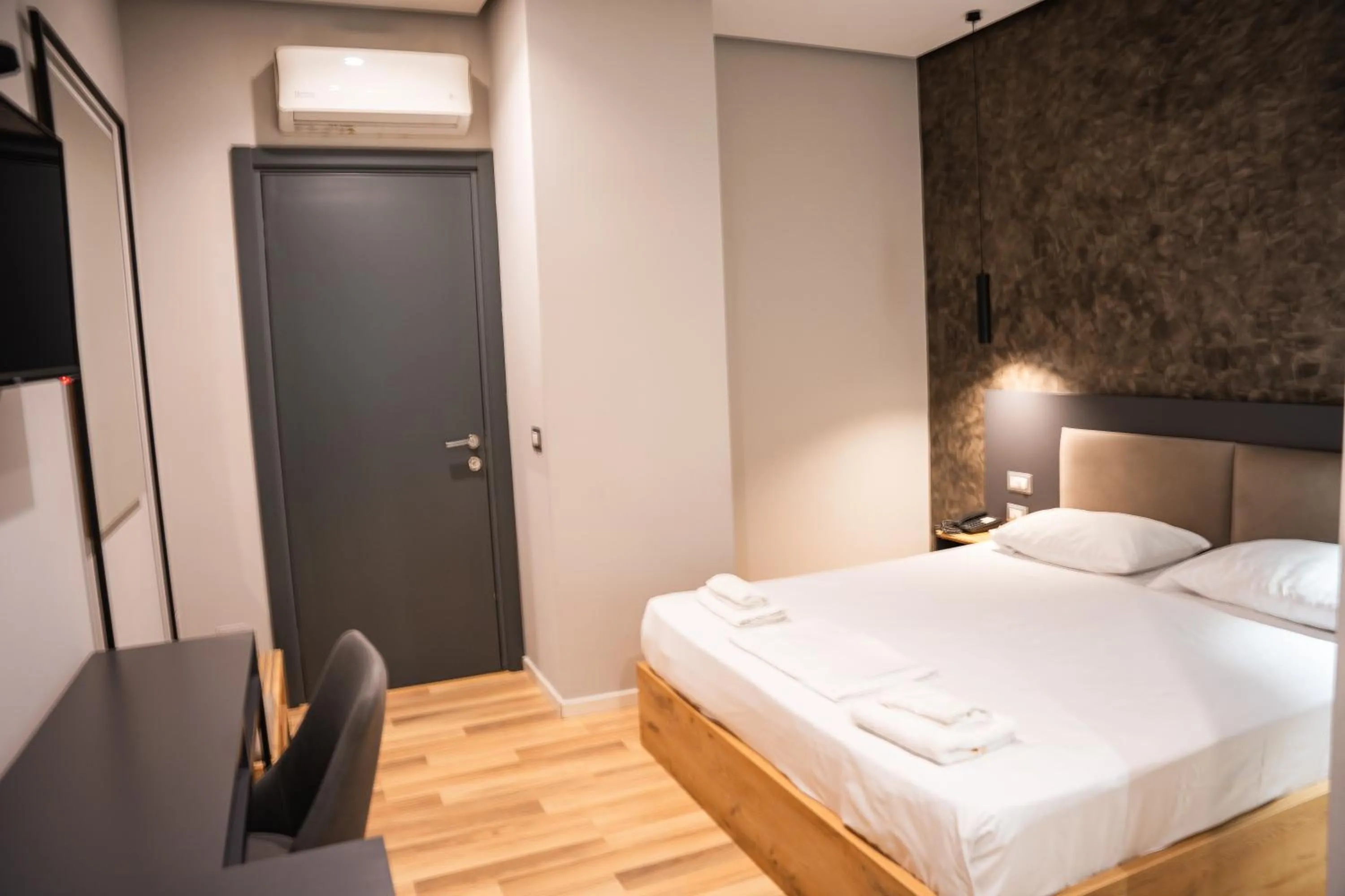 Bed in Center Boutique Hotel