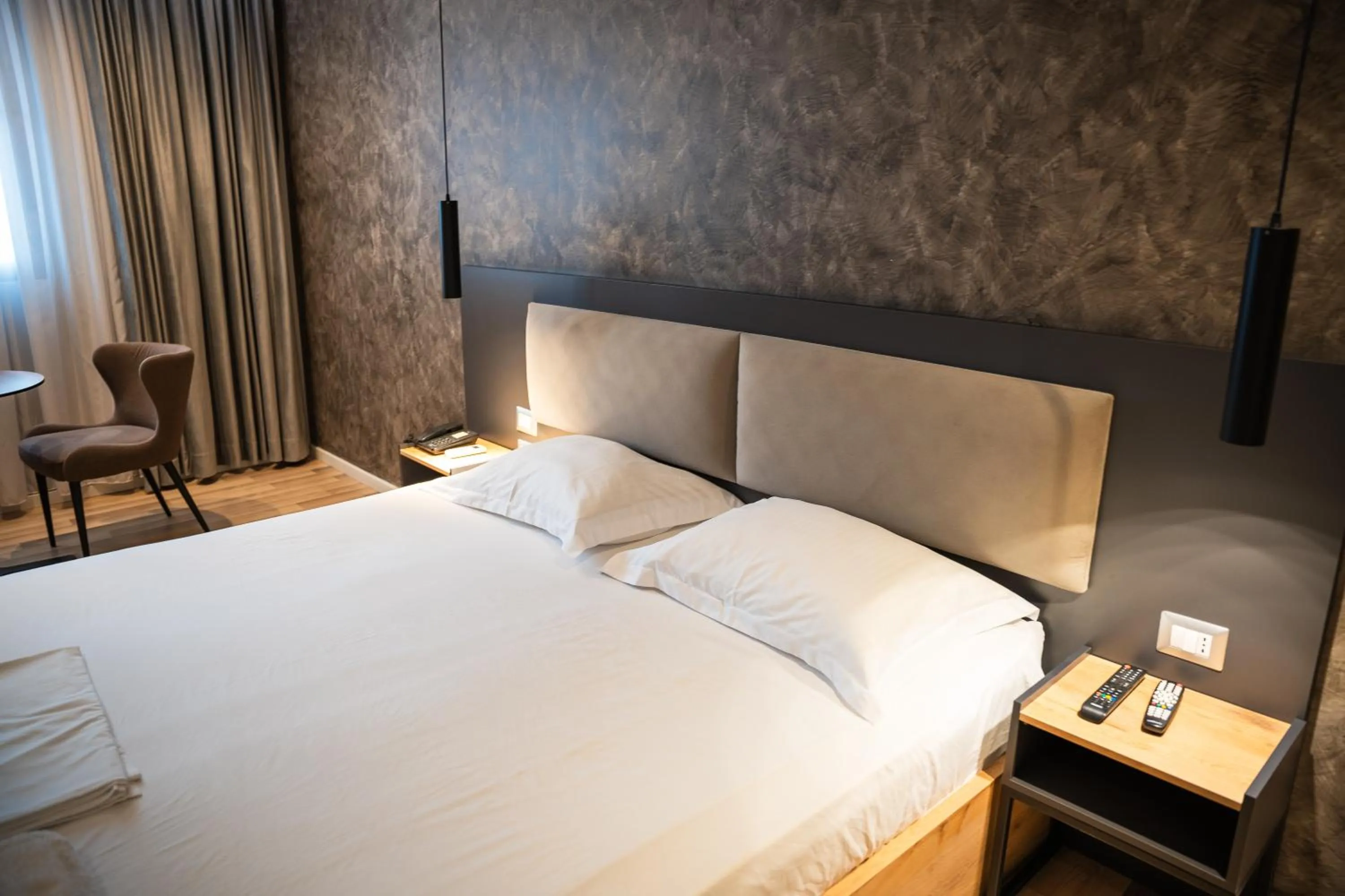 Bed in Center Boutique Hotel