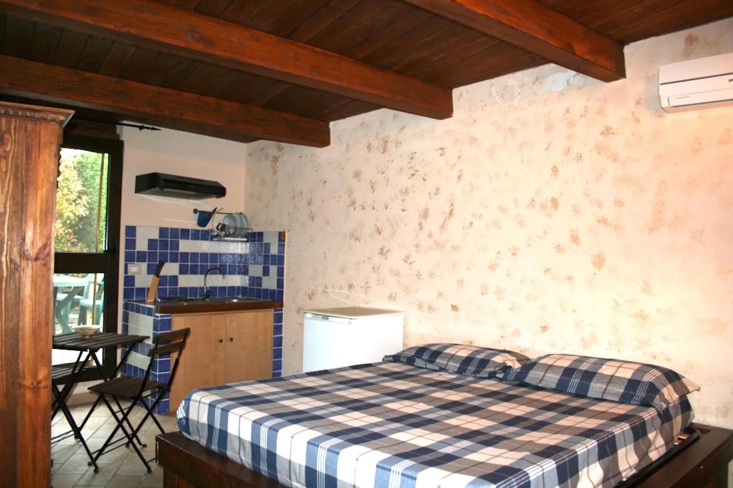 Kitchen or kitchenette, Bed in Al Settimo Cielo