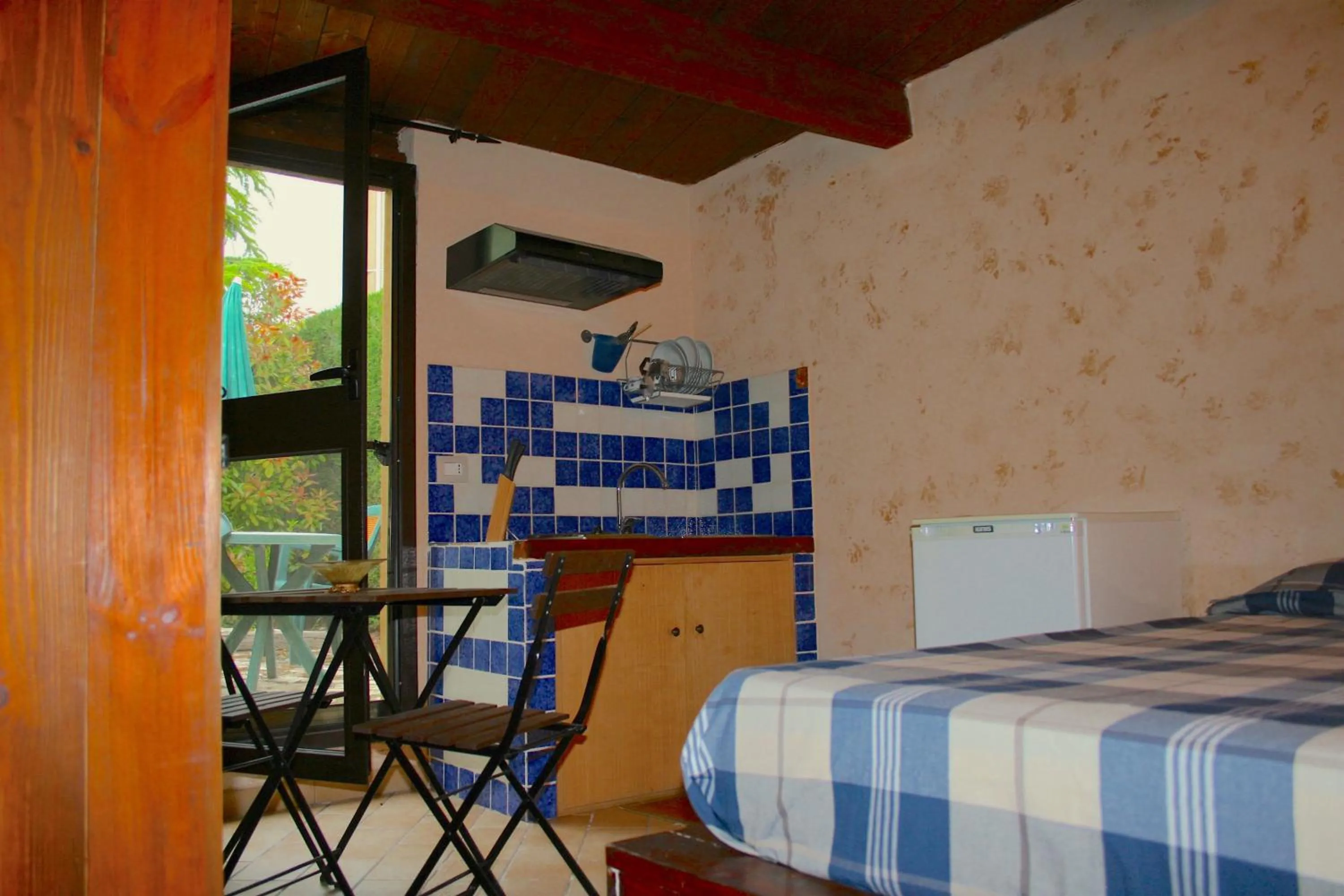 Kitchen or kitchenette, Bed in Al Settimo Cielo