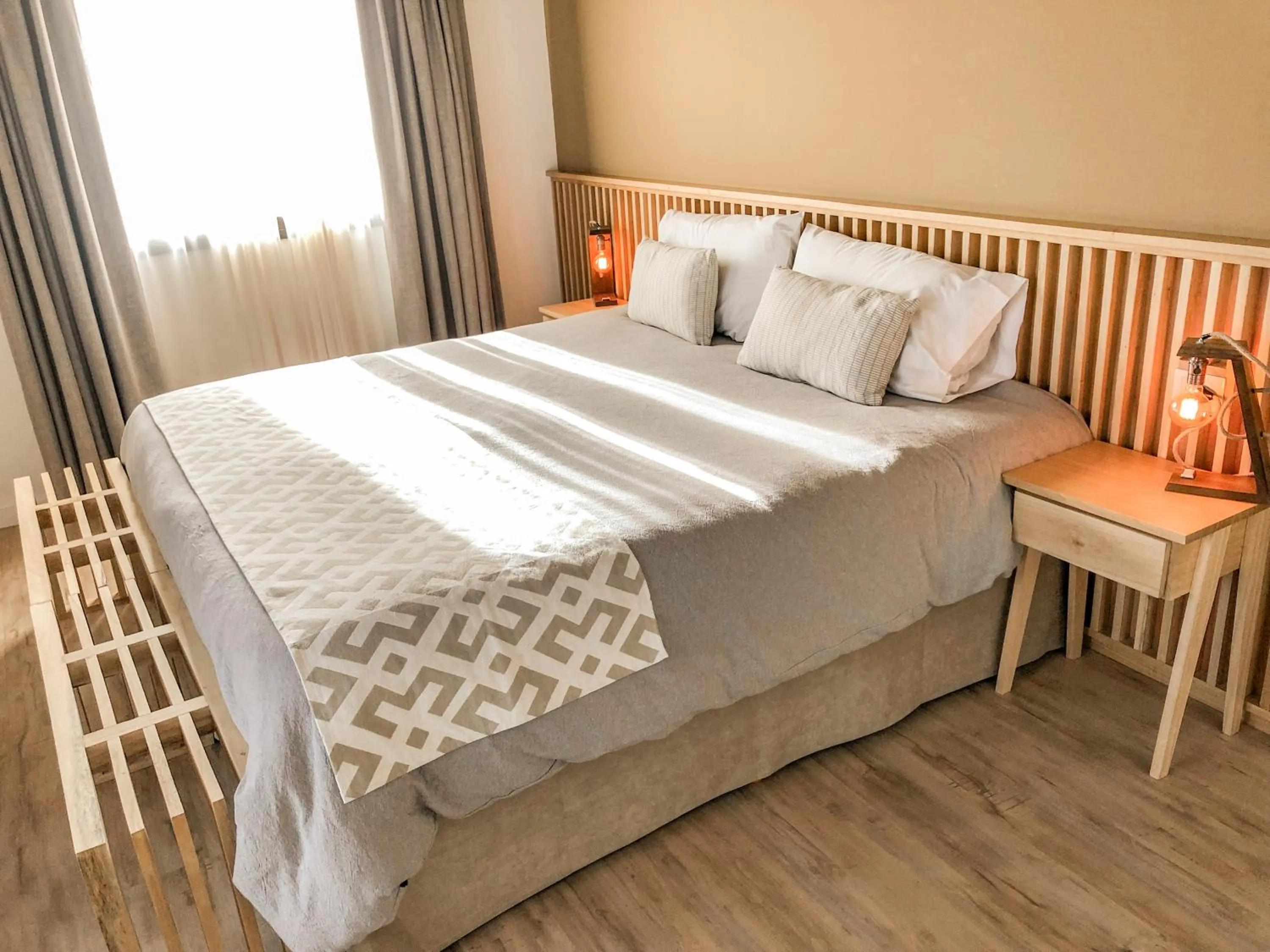 Bed in Senderos Aparts & Suites