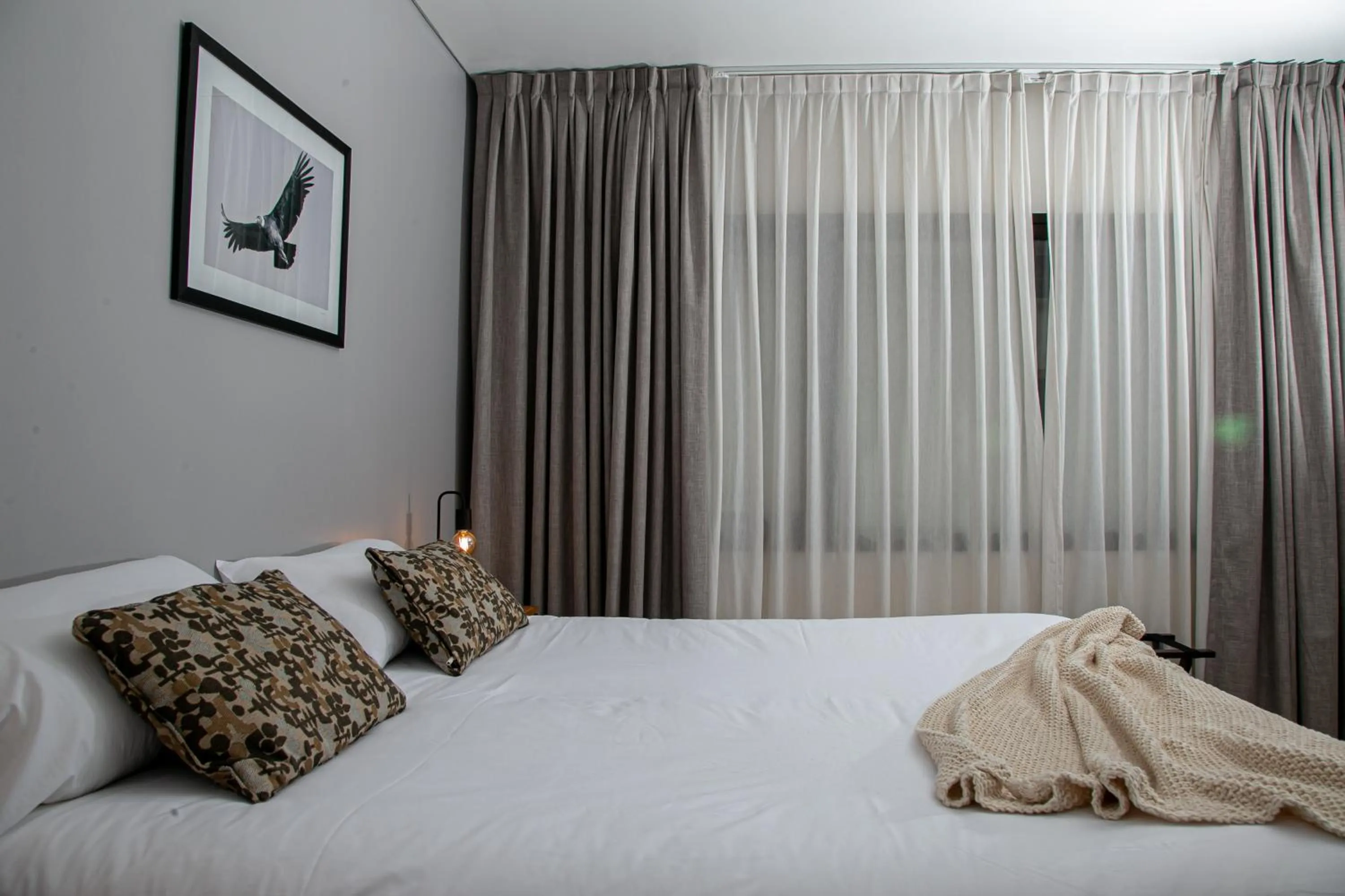 Bed in Senderos Aparts & Suites