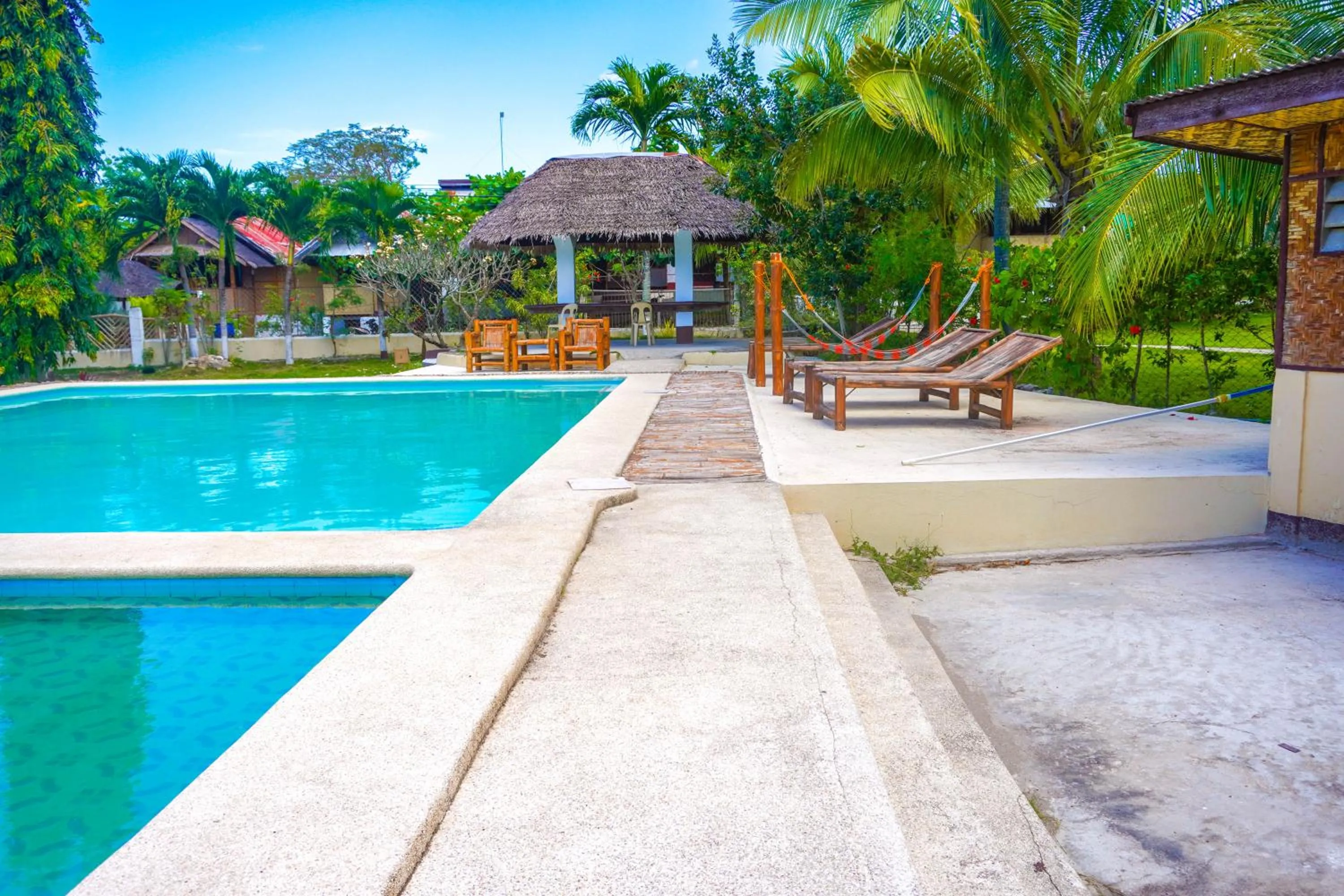 Swimming pool in Native House Resort powered by Cocotel