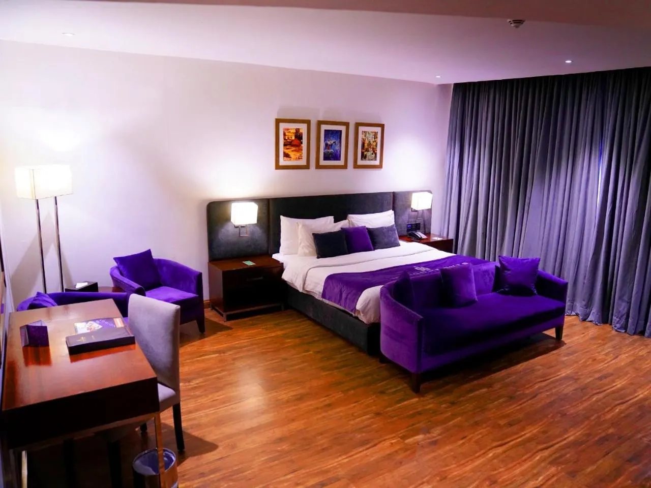 Bed in Indigo Heights Hotel & Suites