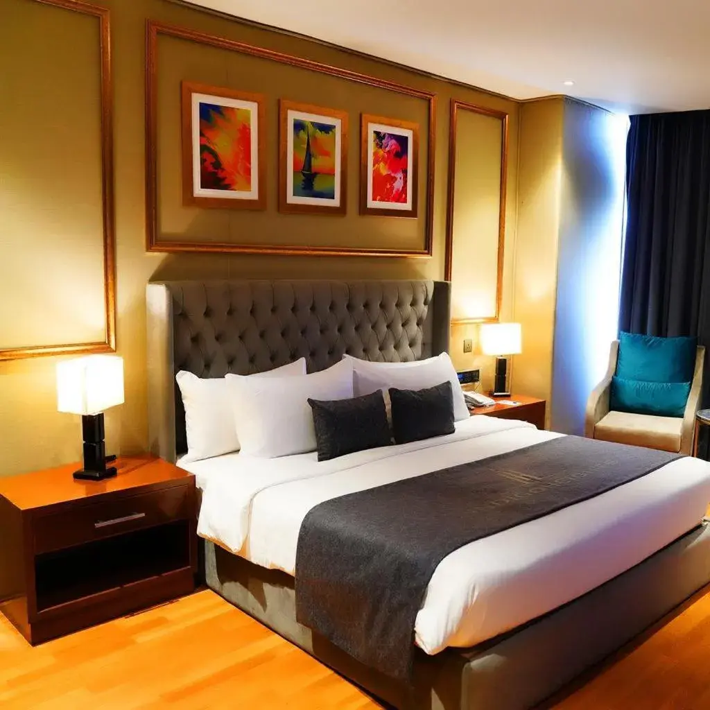 Living room, Bed in Indigo Heights Hotel & Suites Living room, Bed in Indigo Heights Hotel & Suites