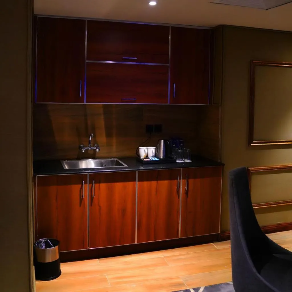 Kitchen or kitchenette in Indigo Heights Hotel & Suites