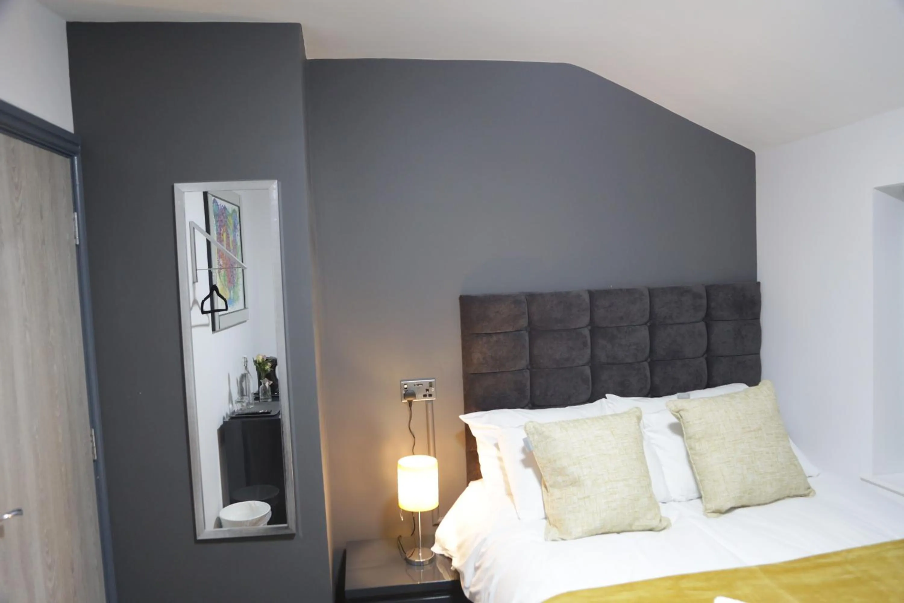 Bedroom in Park City Suites Hotel