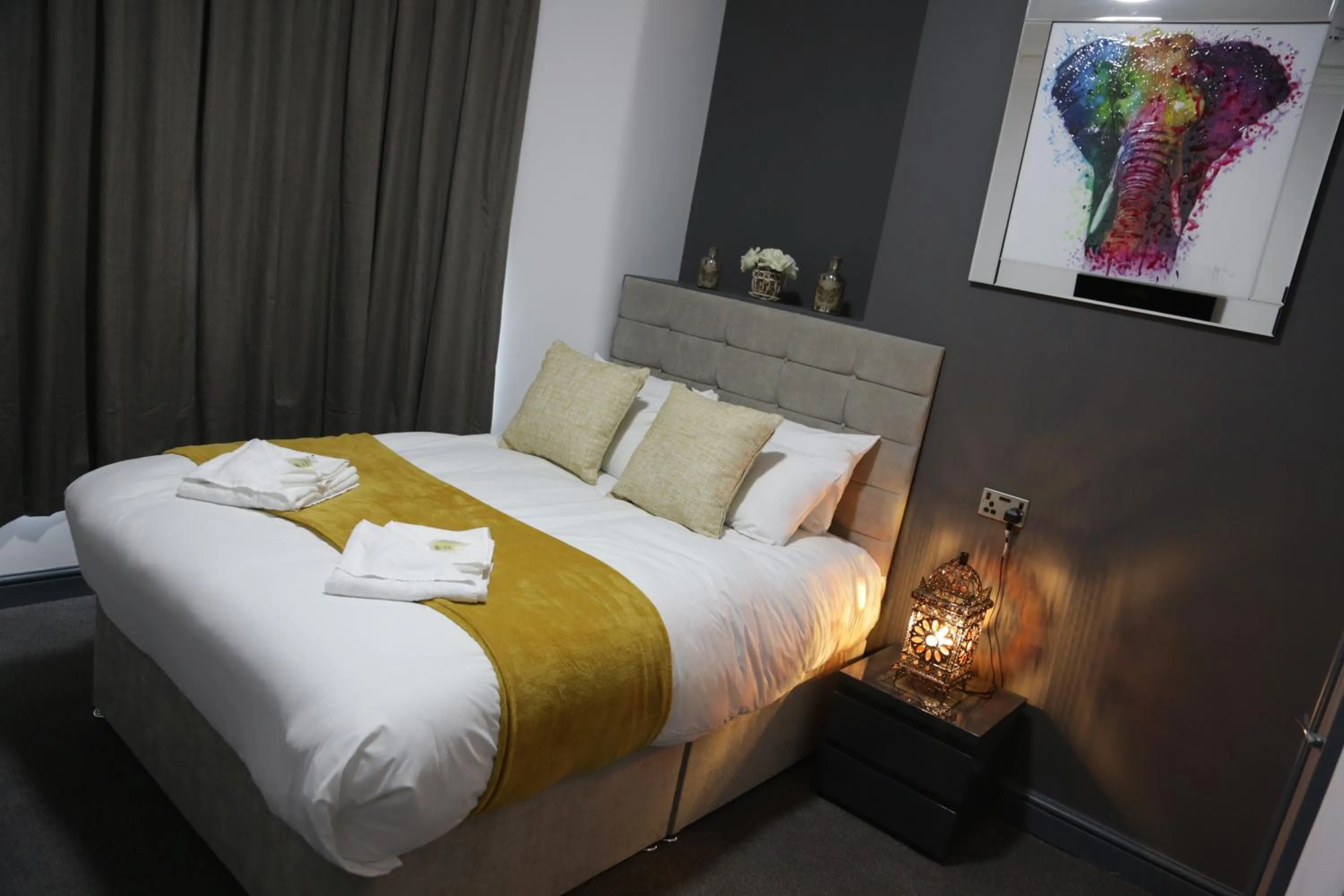 Bed in Park City Suites Hotel