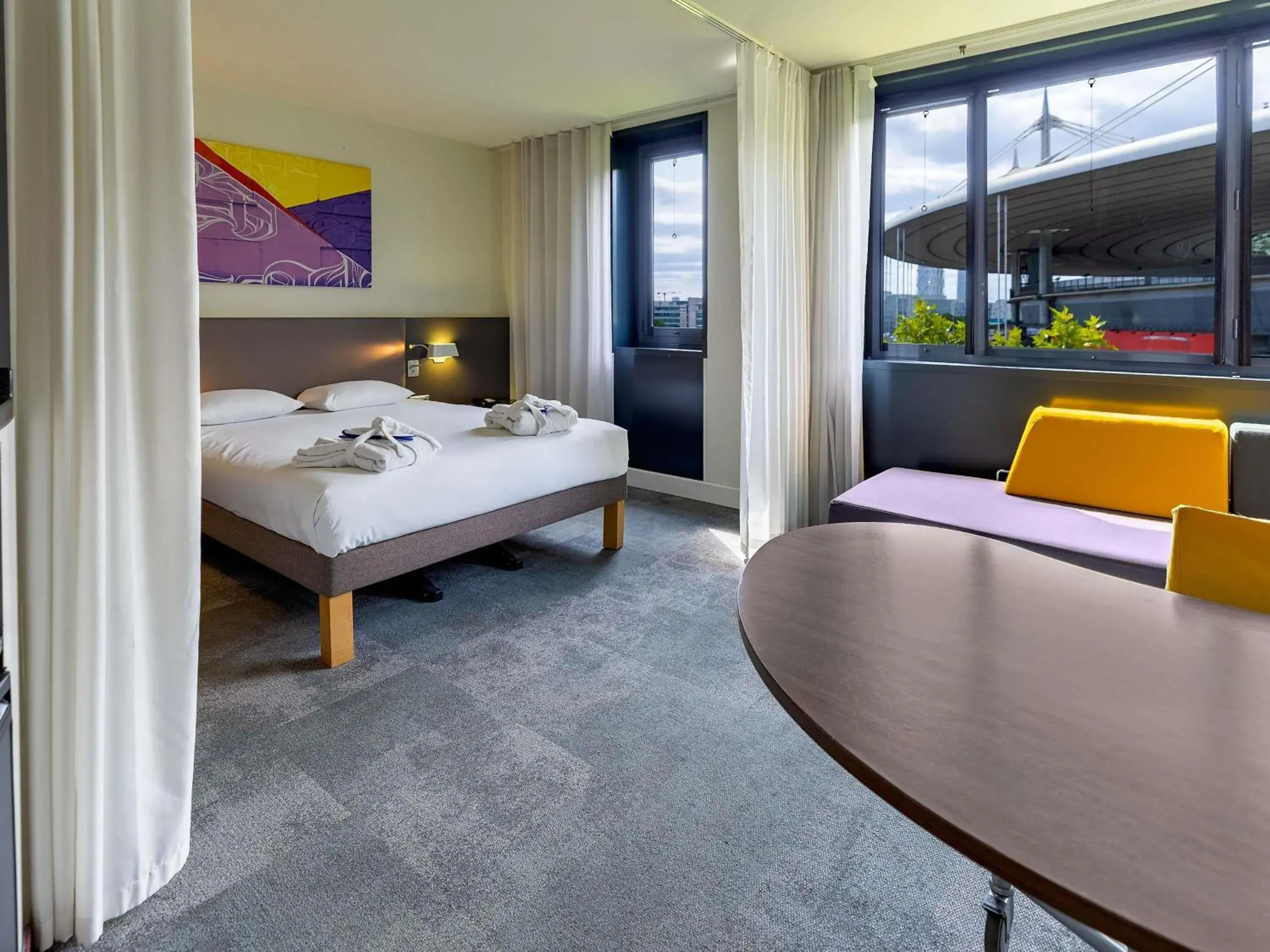 Executive Suite with One Double Bed and One Single Sofa Bed in Novotel Suites Paris Stade de France Executive Suite with One Double Bed and One Single Sofa Bed in Novotel Suites Paris Stade de France