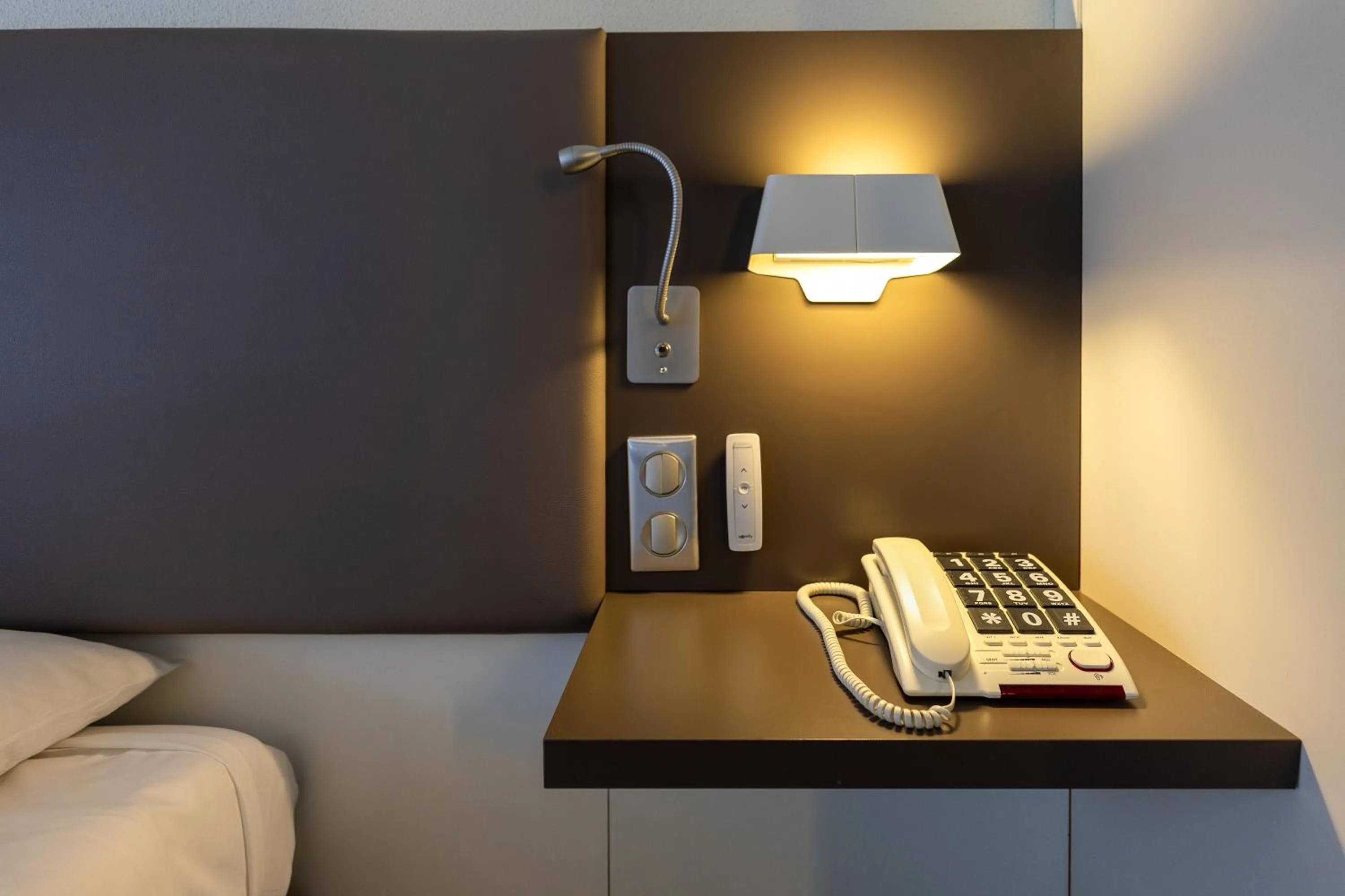 Bed in Novotel Suites Paris Stade de France