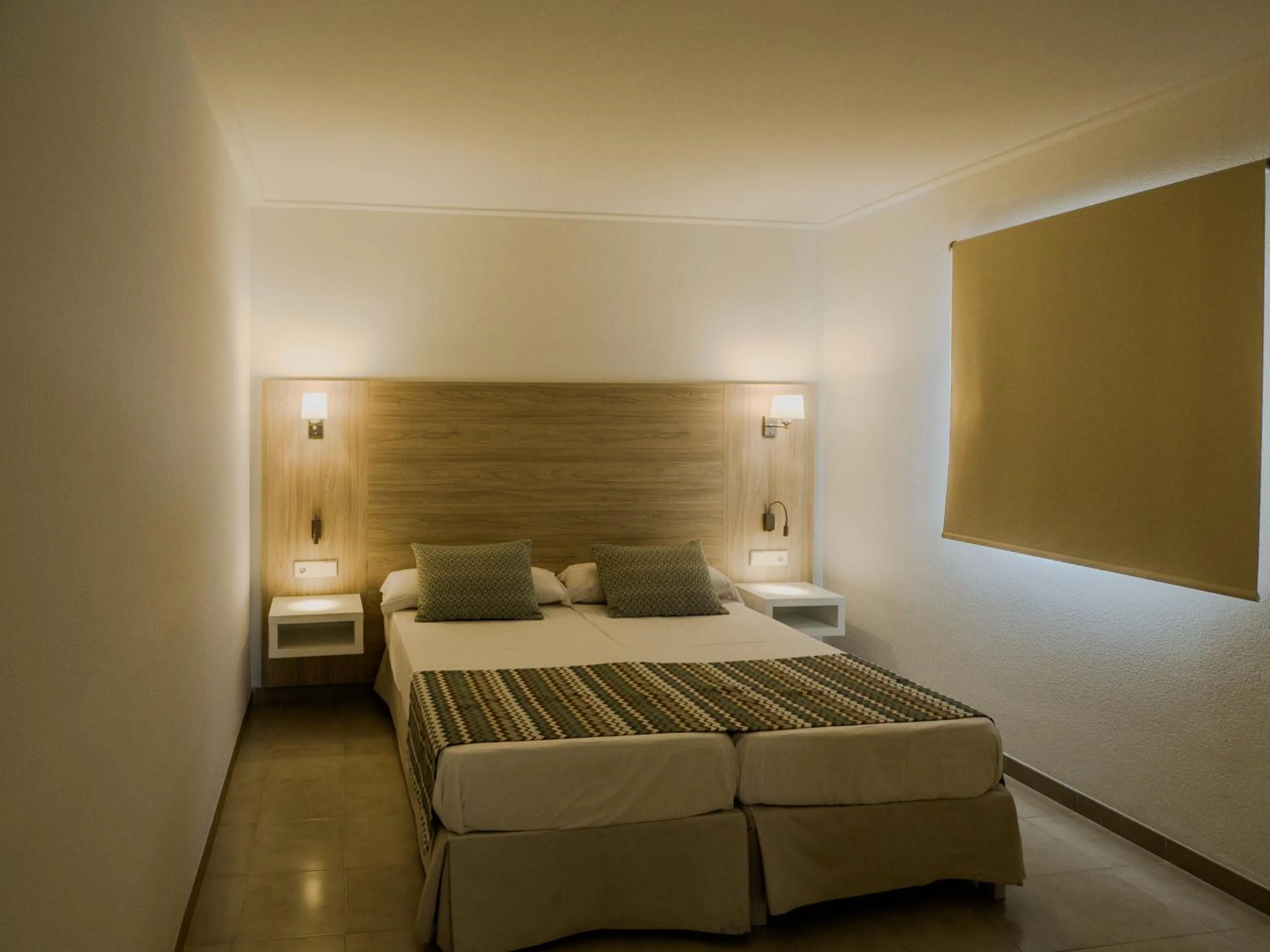 Bed in Apartamentos La Santa Maria