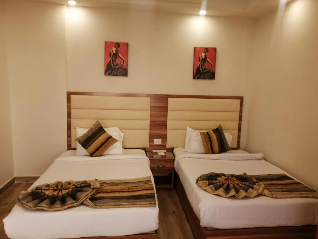 Bed in Jewel San Stefano Hotel