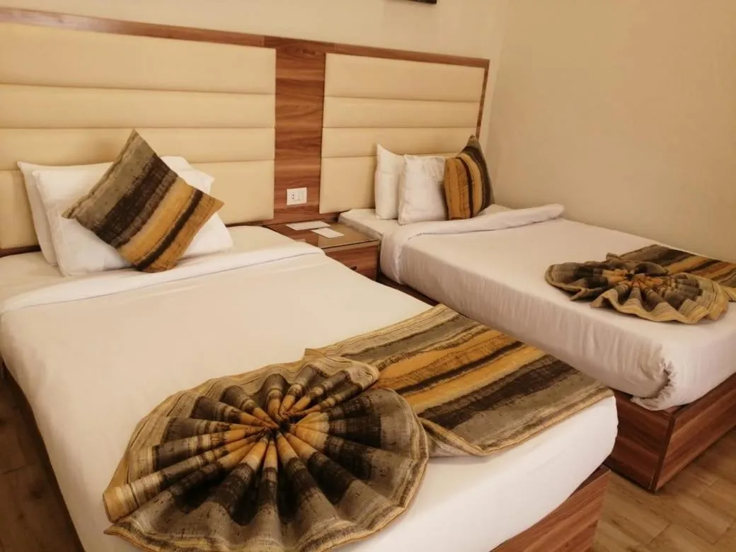 Bed in Jewel San Stefano Hotel