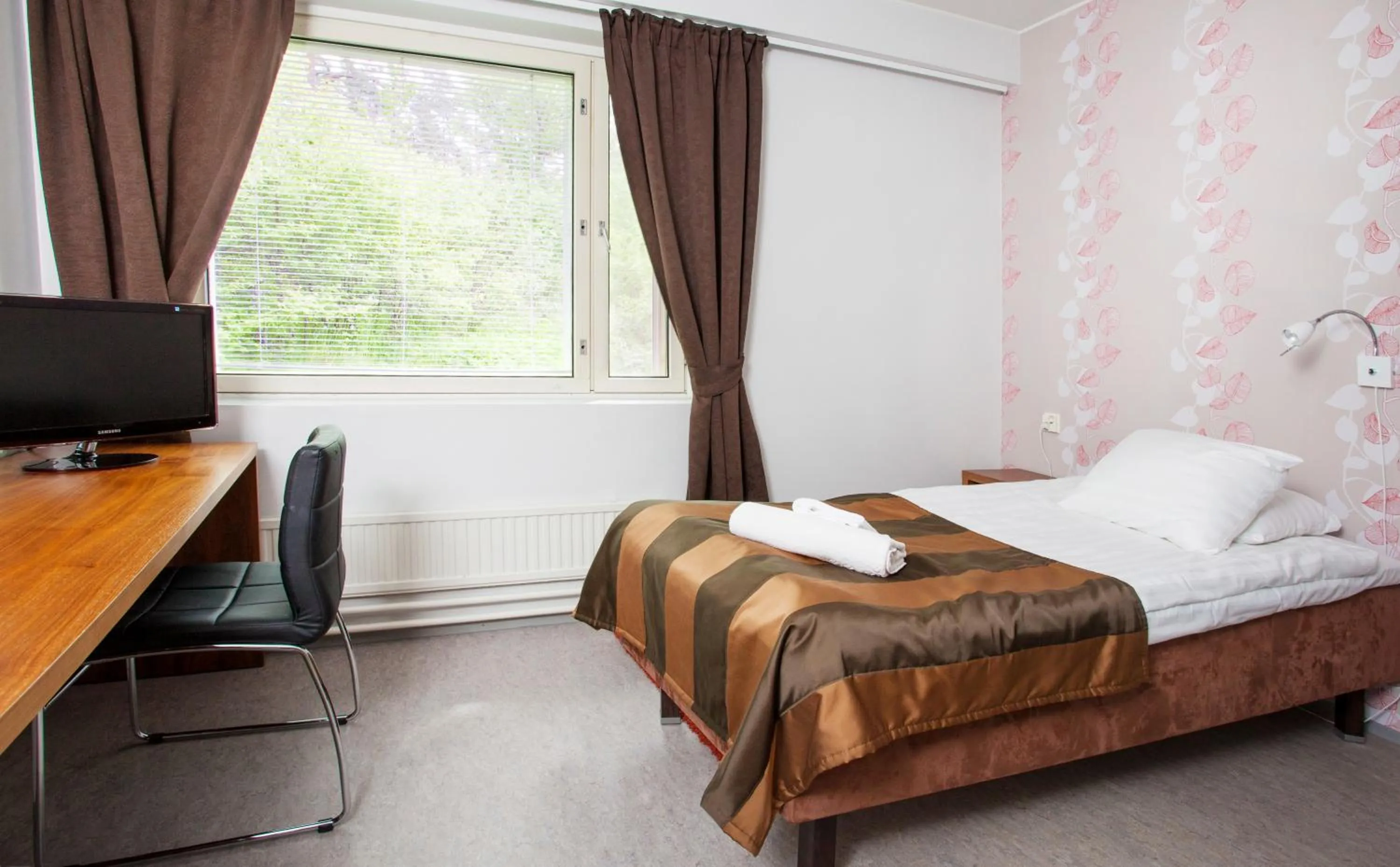 Bed in Backbyn Kartano