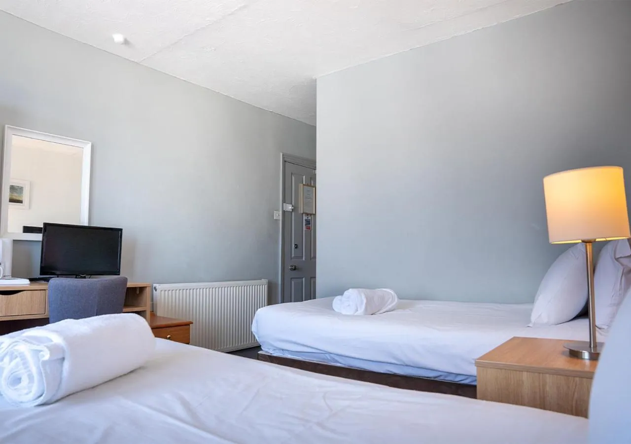 Bed in The Seafront Hotel by Compass Hospitality