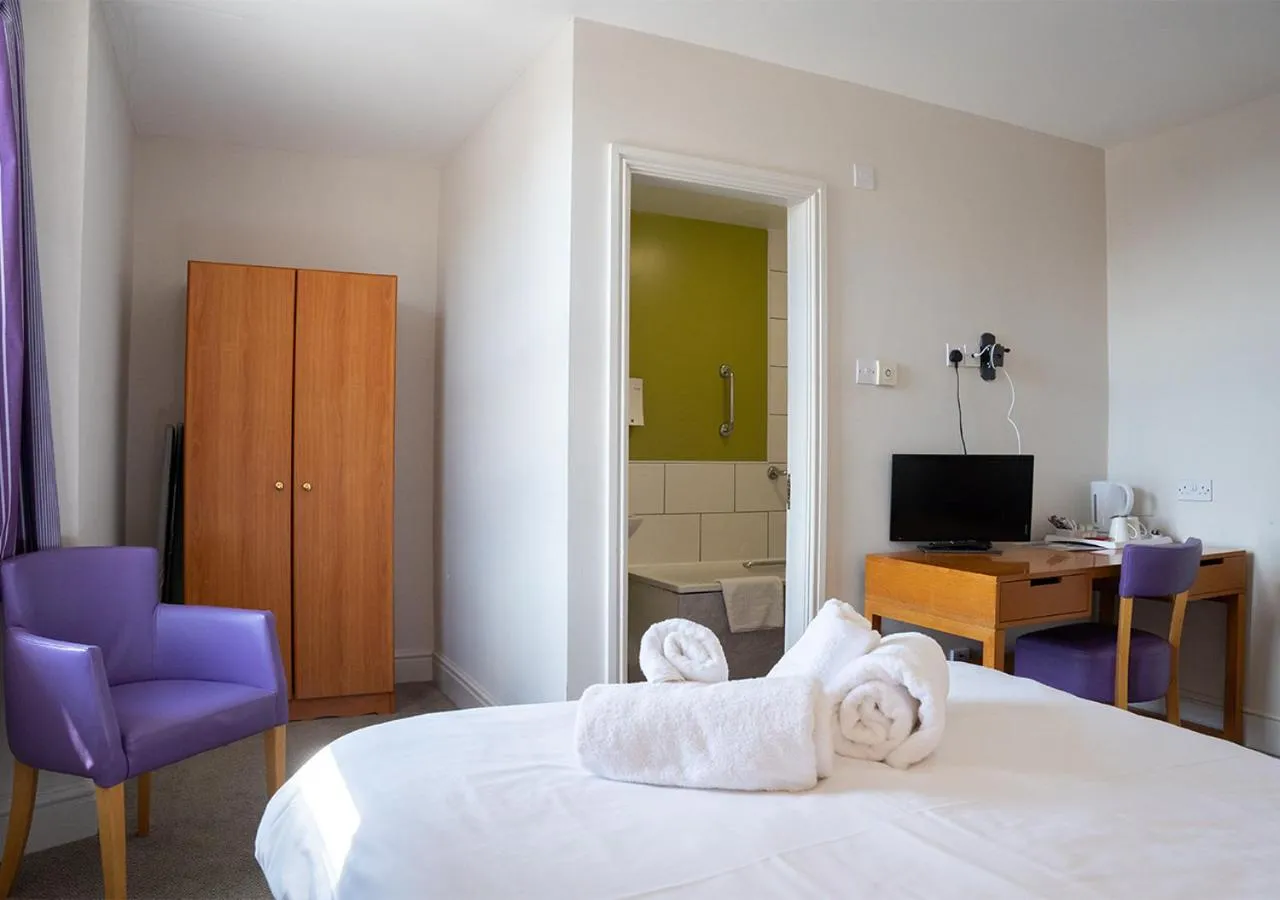 Bed in The Seafront Hotel by Compass Hospitality