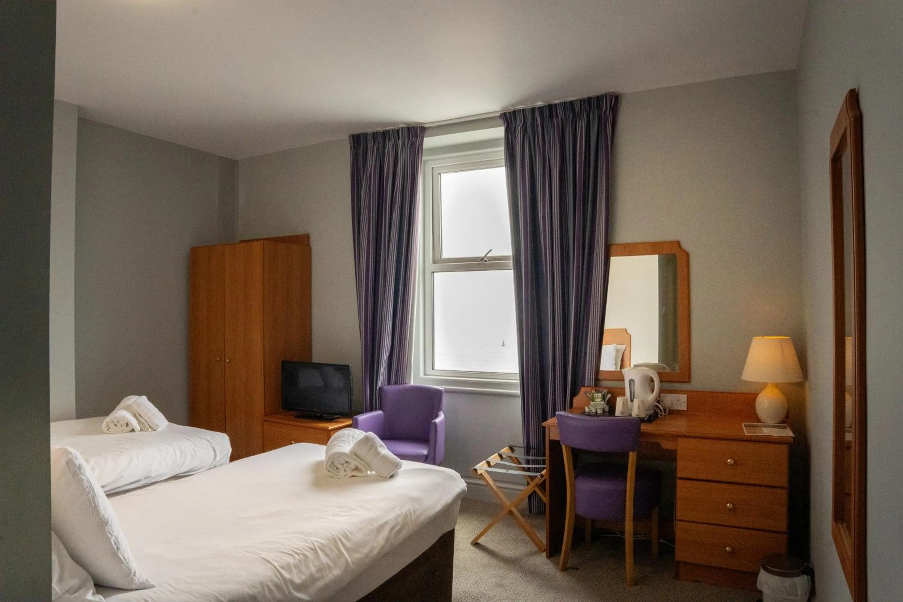Bed in The Seafront Hotel by Compass Hospitality