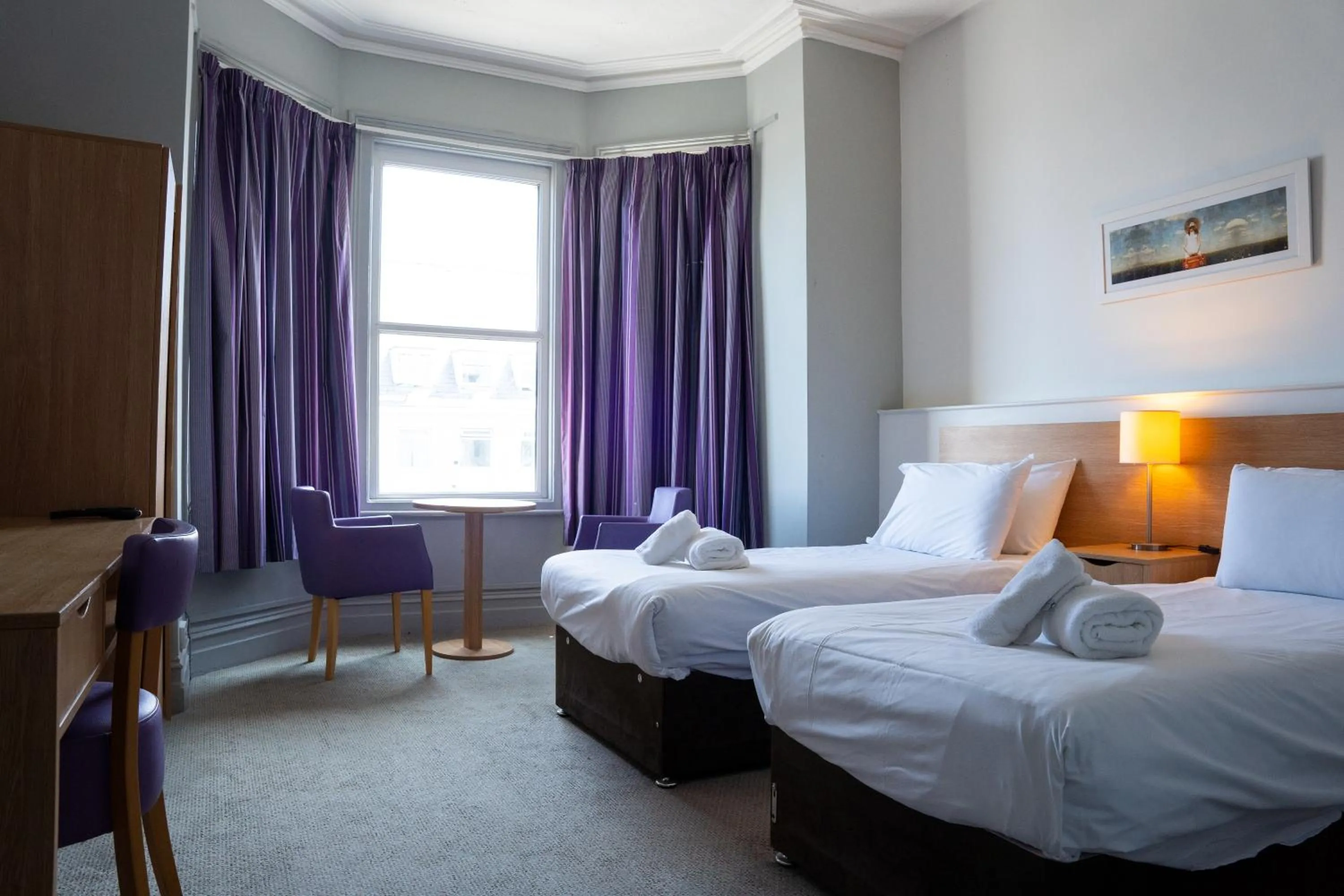 Bed in The Seafront Hotel by Compass Hospitality