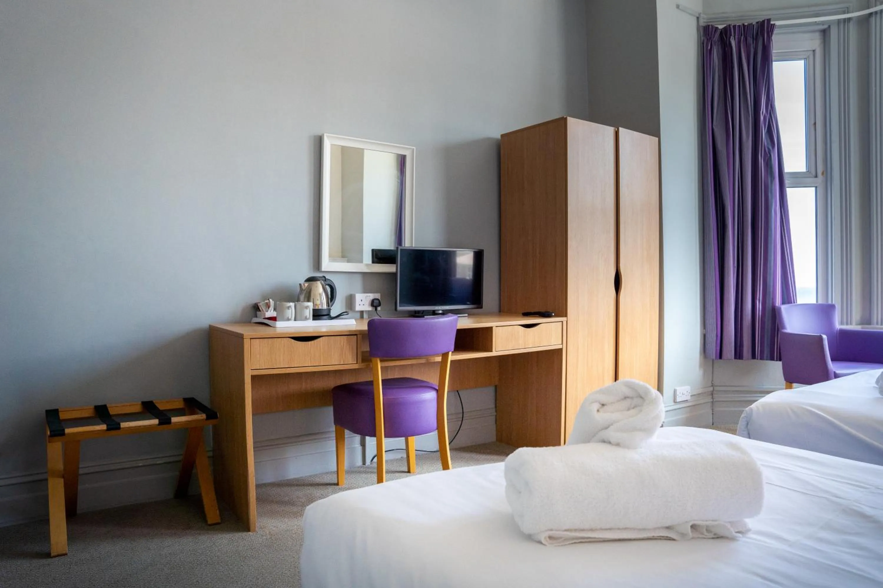 Bed in The Seafront Hotel by Compass Hospitality