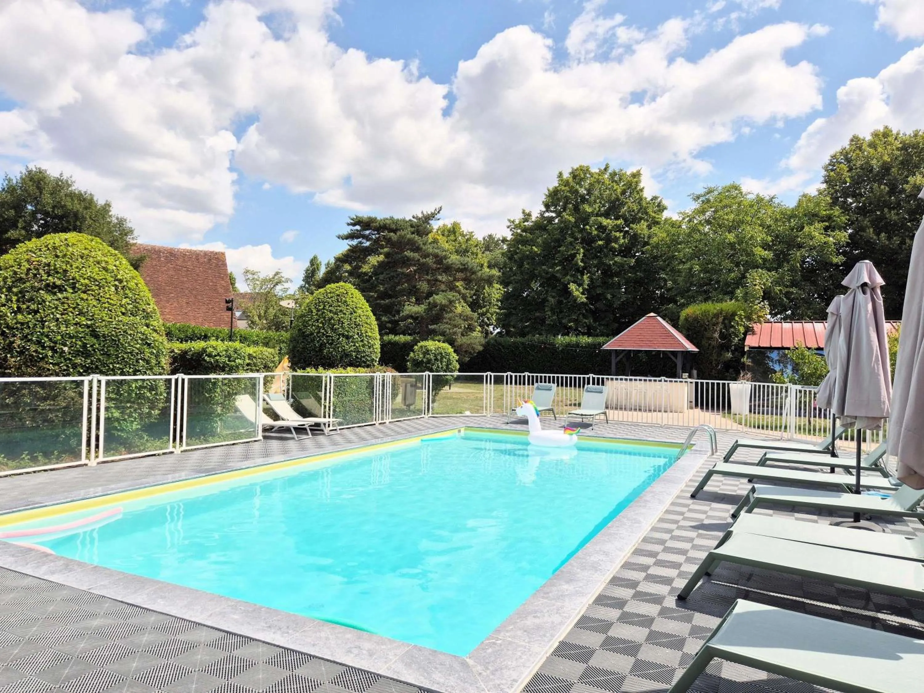 Pool view in ibis Styles Tours Sud