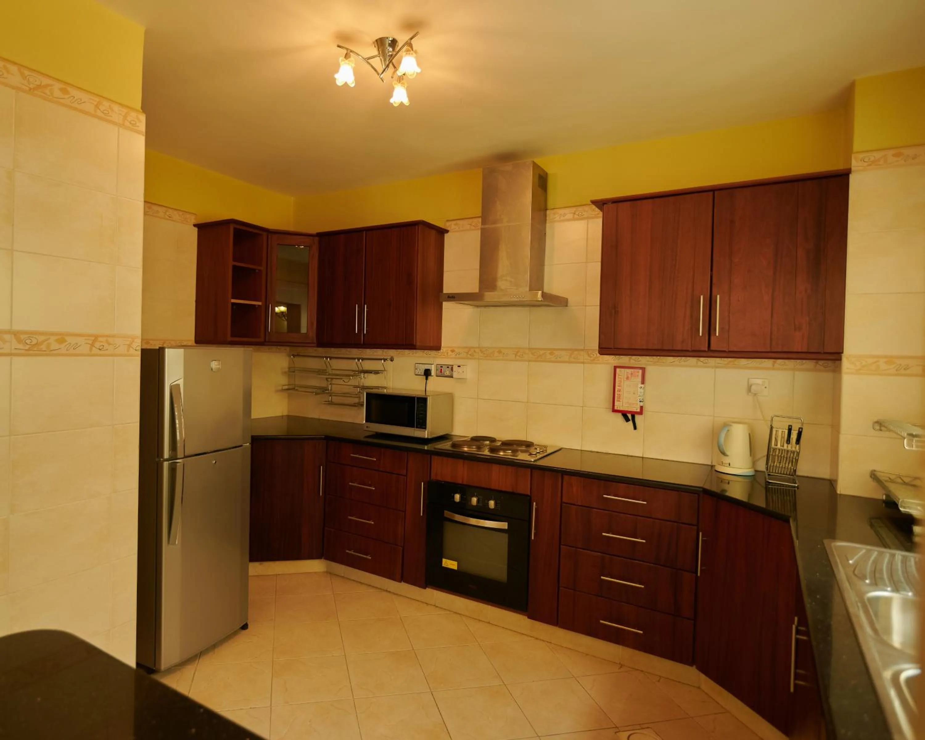 Kitchen or kitchenette in Batians Apartment Hotel