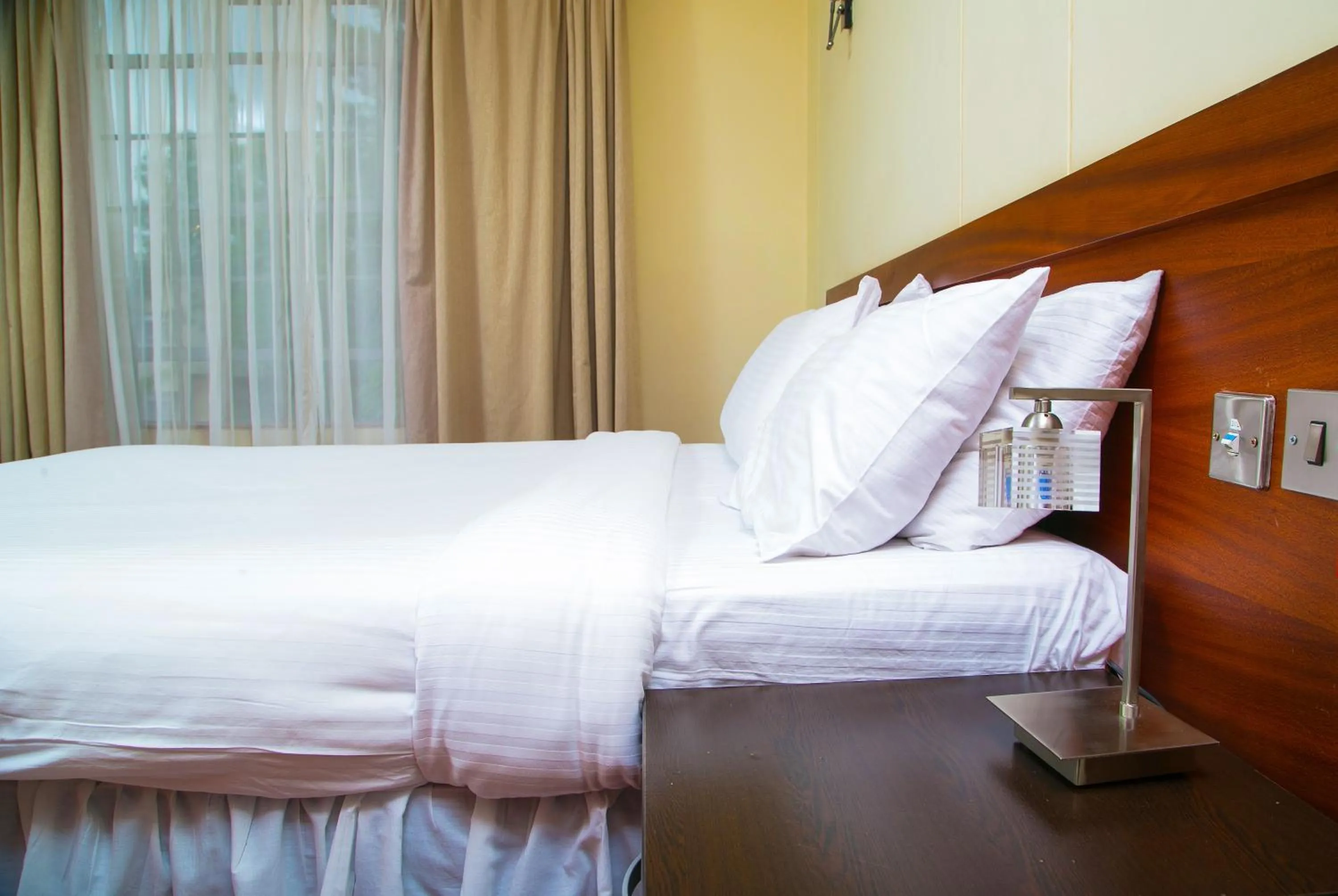 Bed in Batians Apartment Hotel