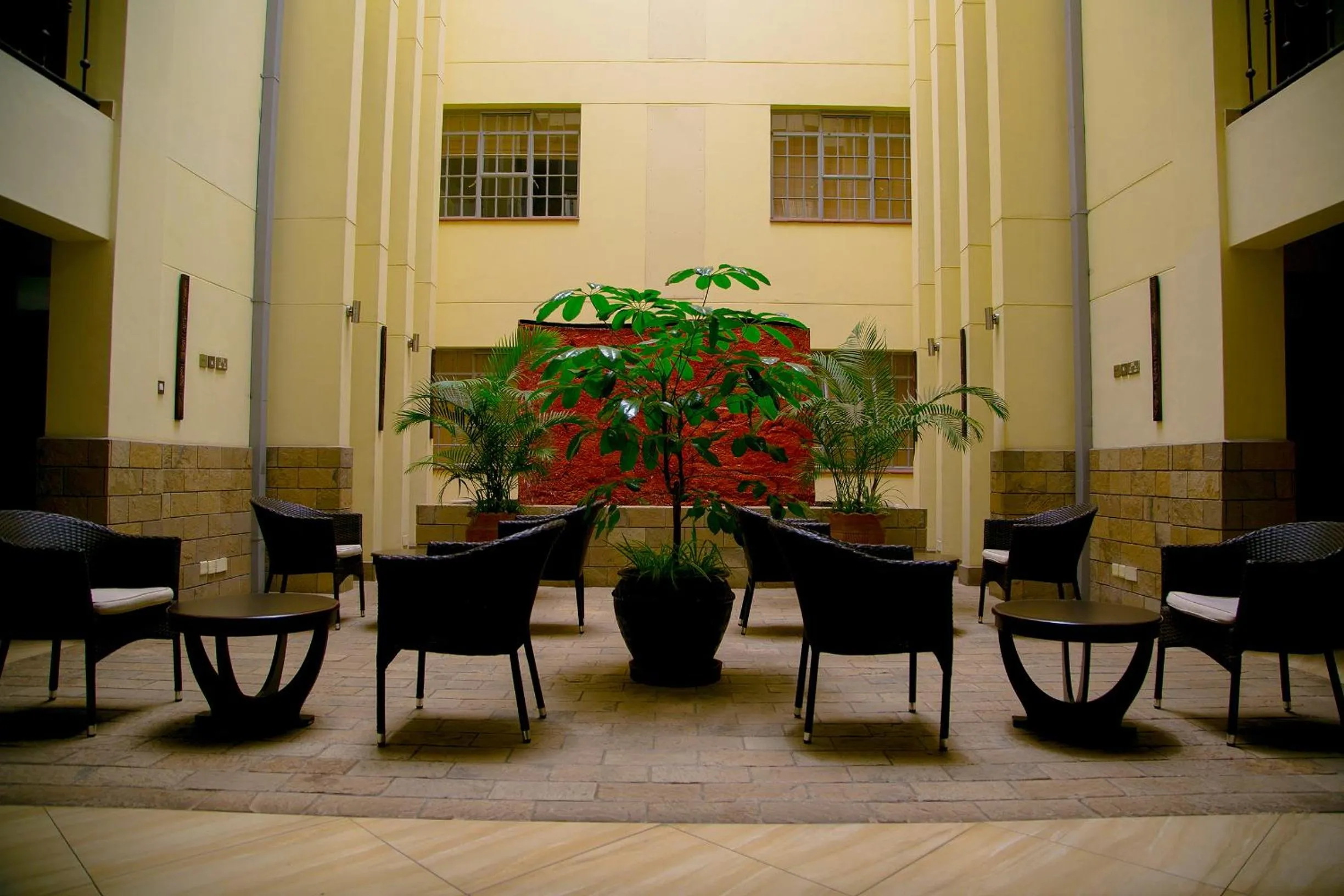 Communal lounge/ TV room in Batians Apartment Hotel