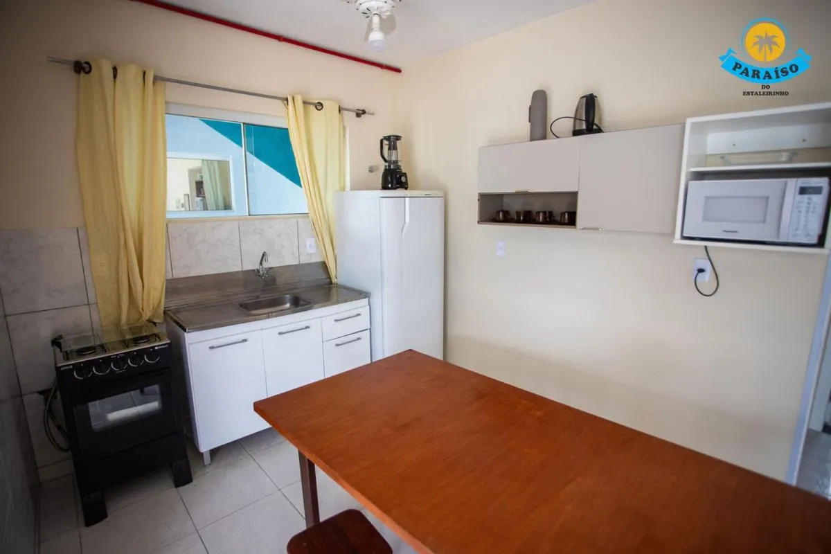 Kitchen or kitchenette in Paraiso do Estaleirinho - Balneario Camboriu