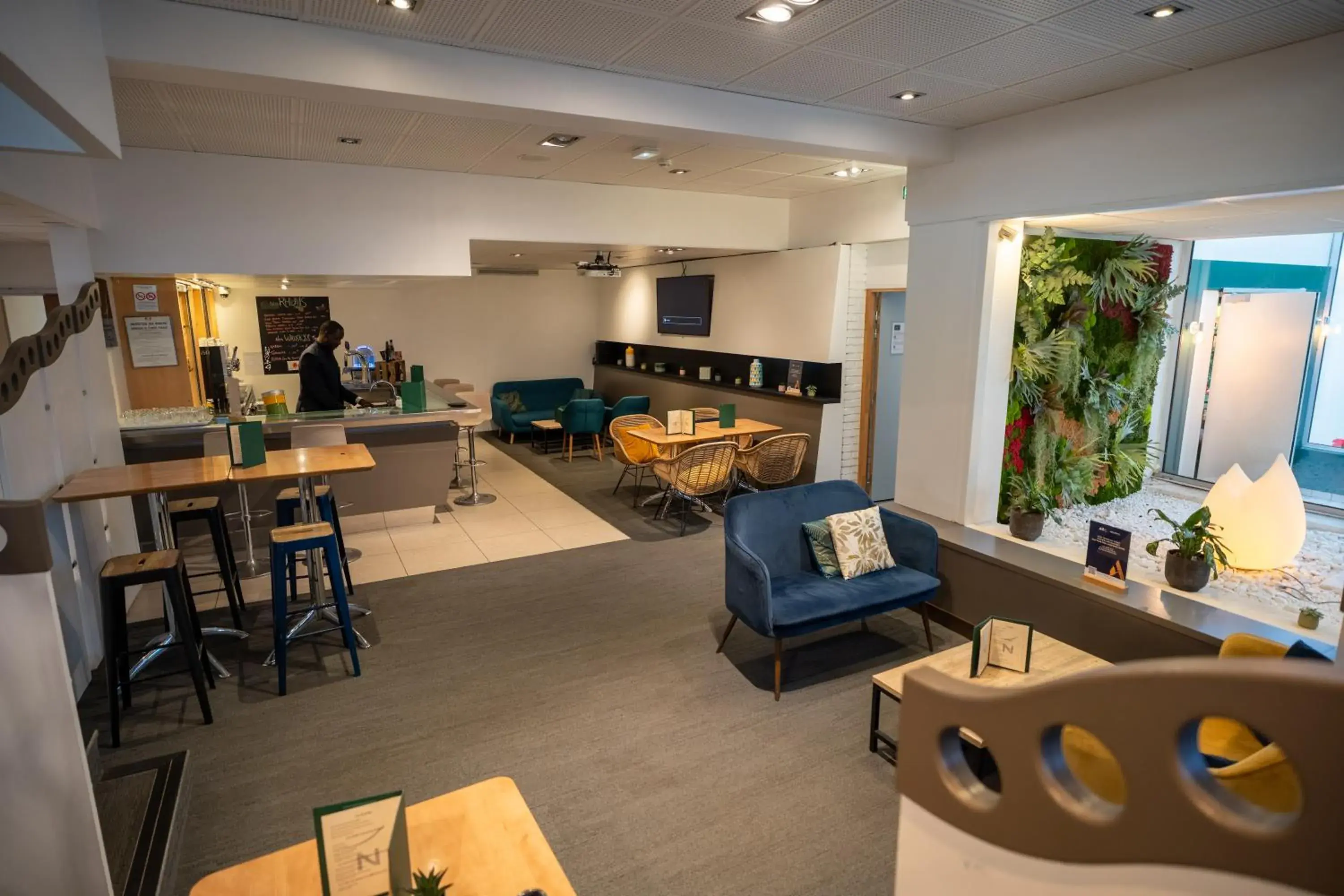 Lounge or bar in Novotel Poissy Orgeval Lounge or bar in Novotel Poissy Orgeval