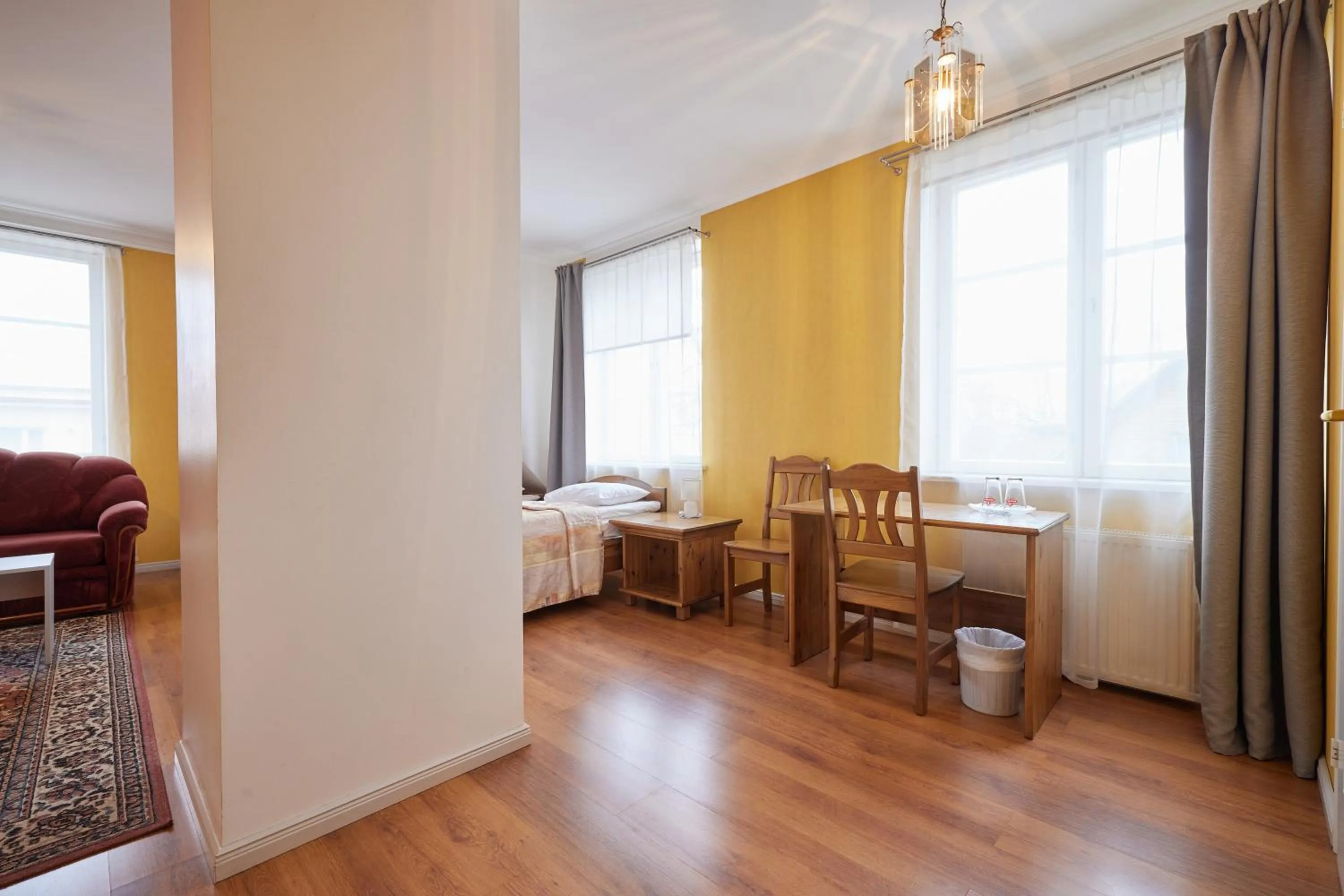 Seating area, Bed in Villa Wesenbergh