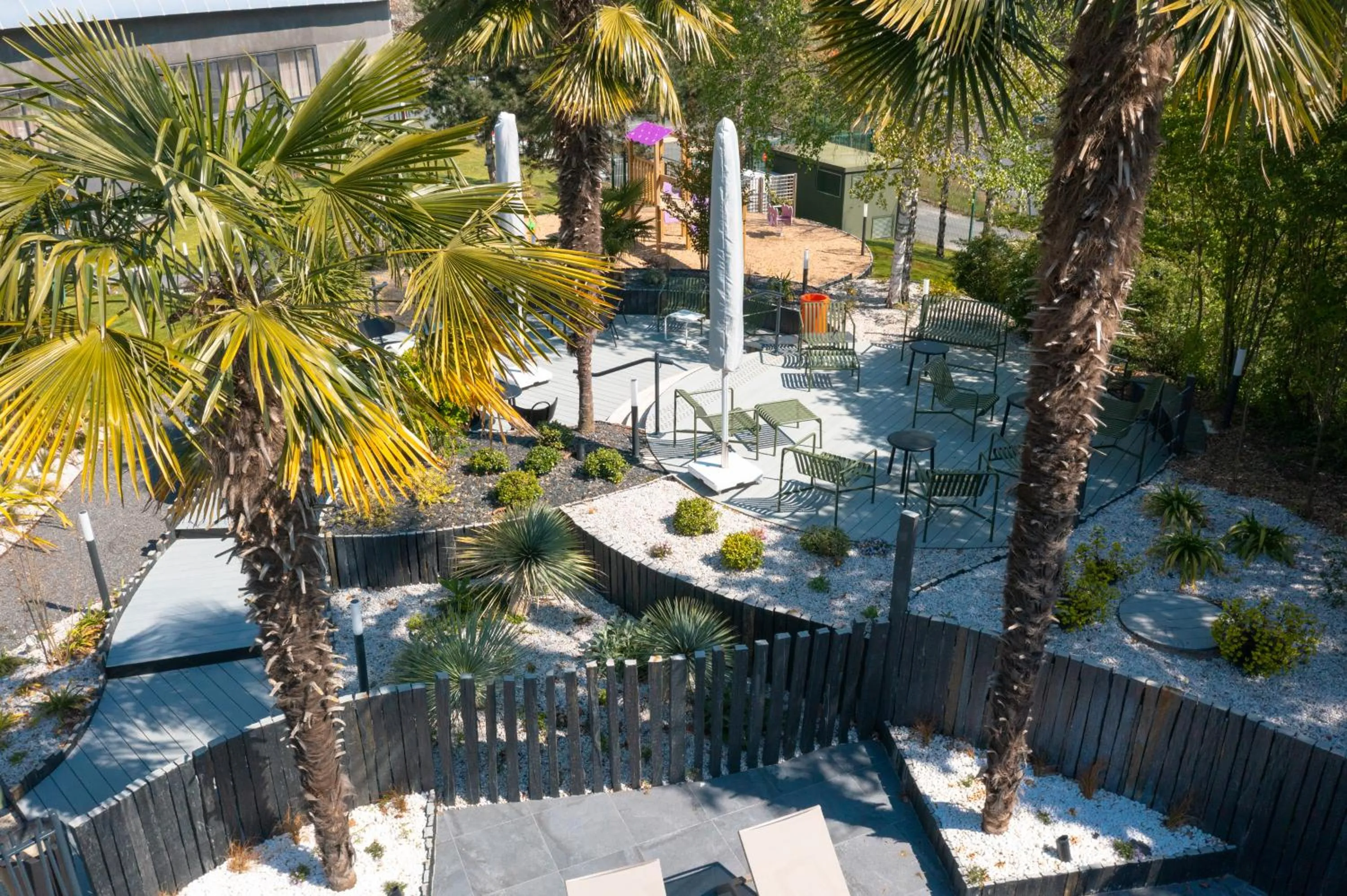 Garden view in Novotel Poitiers Site du Futuroscope