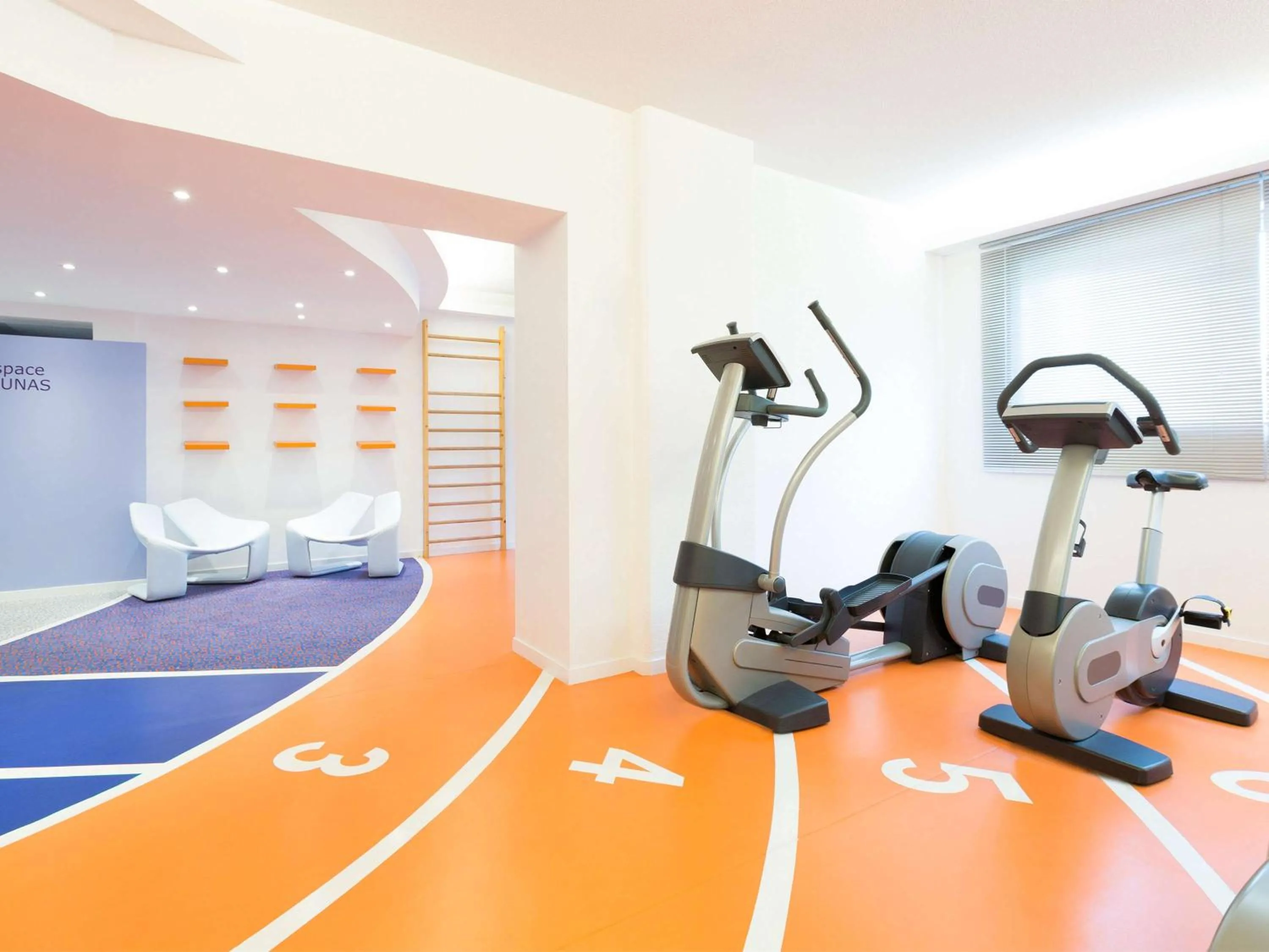 Fitness centre/facilities in Novotel Poitiers Site du Futuroscope