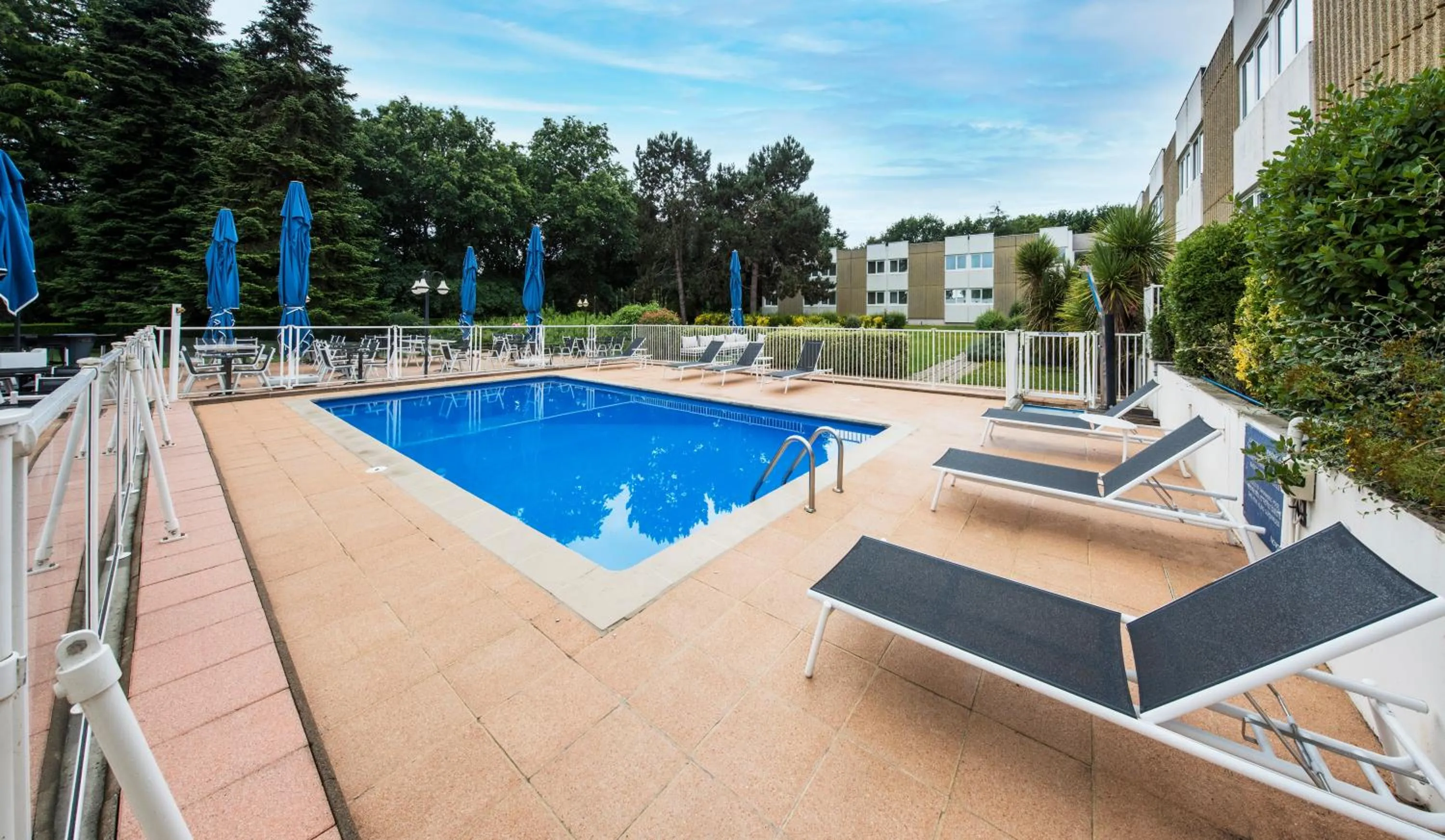 Pool view in Novotel Rennes Alma