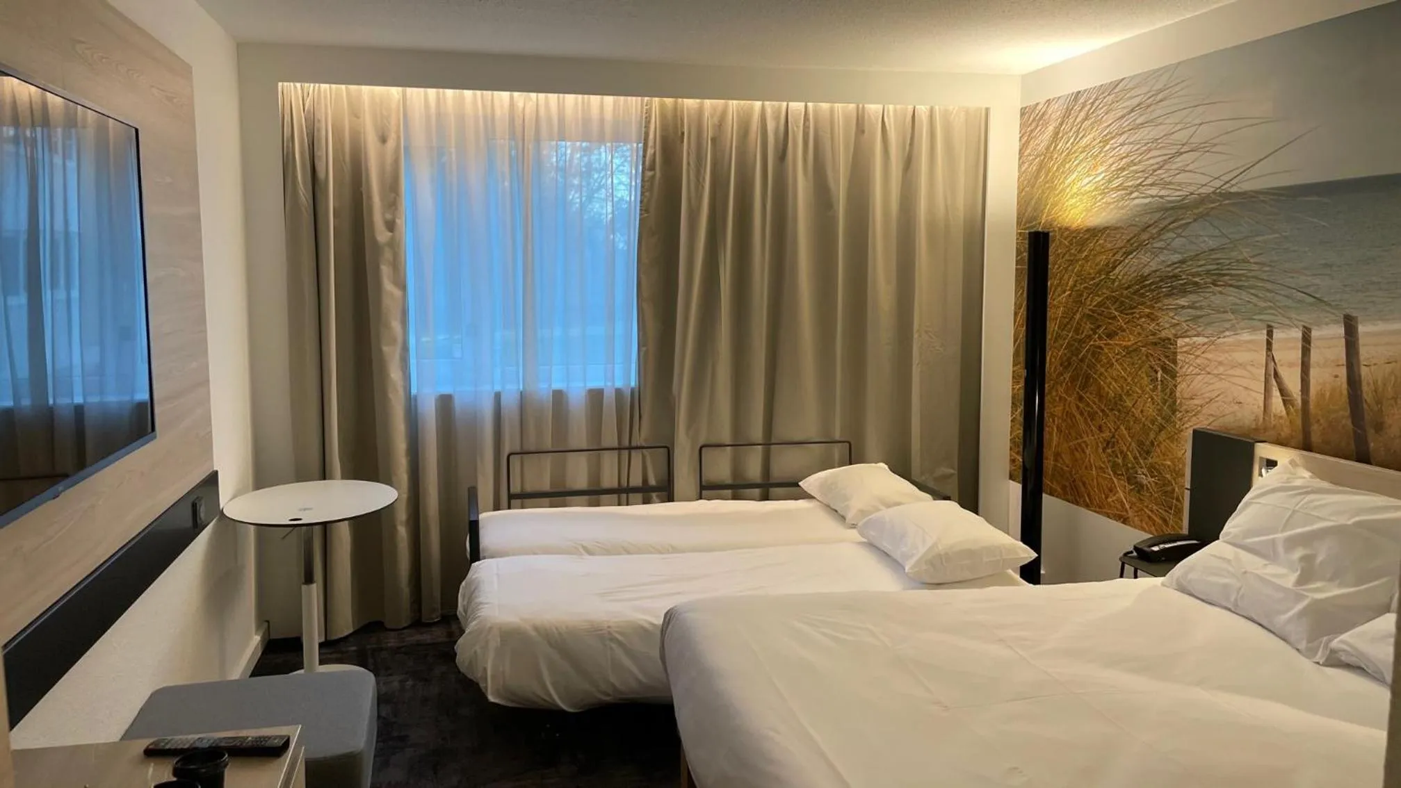 Bed in Novotel Rennes Alma