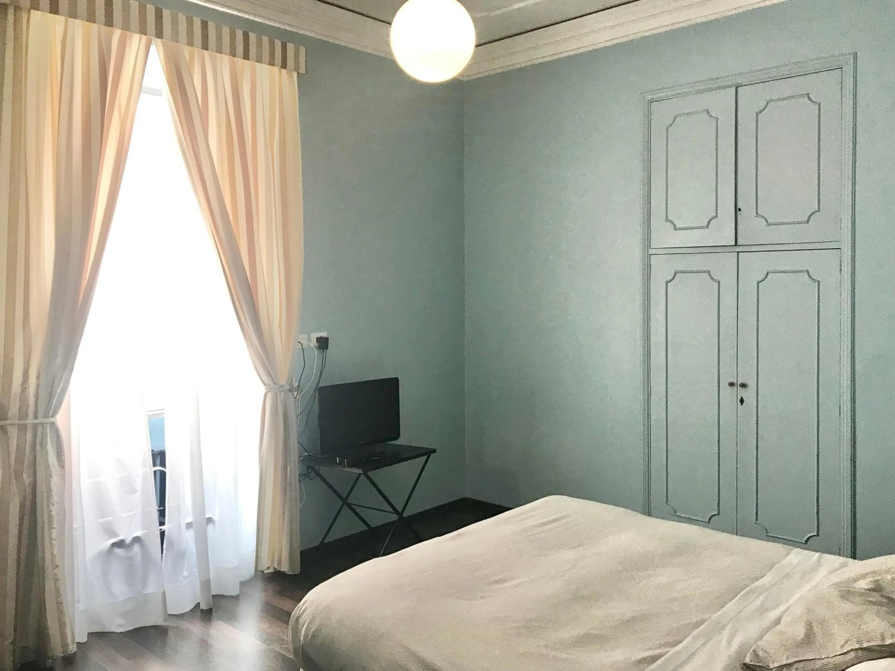 Bed in B&B Santi Quattro Al Colosseo