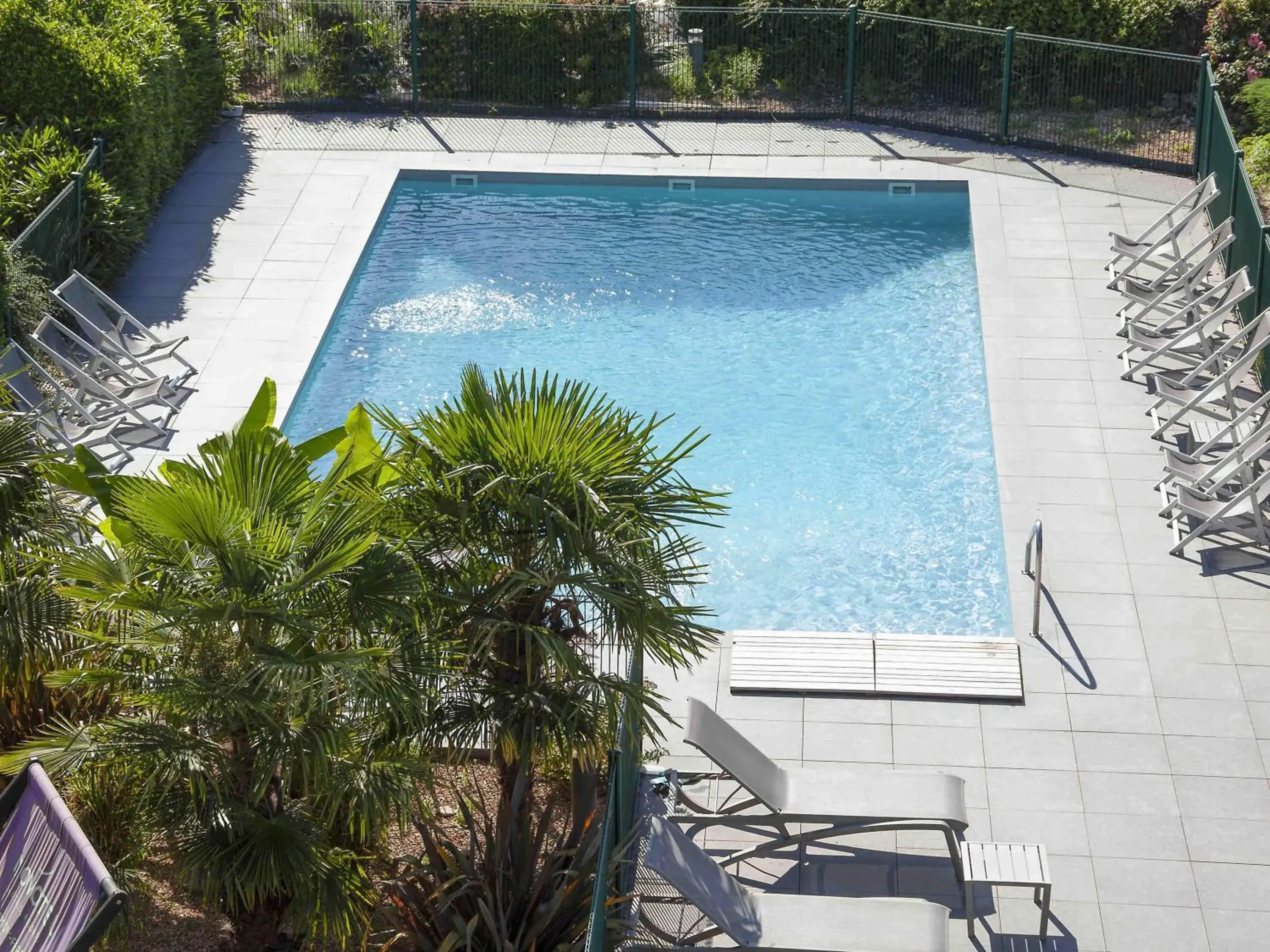 Pool view in Novotel Clermont-Ferrand Pool view in Novotel Clermont-Ferrand