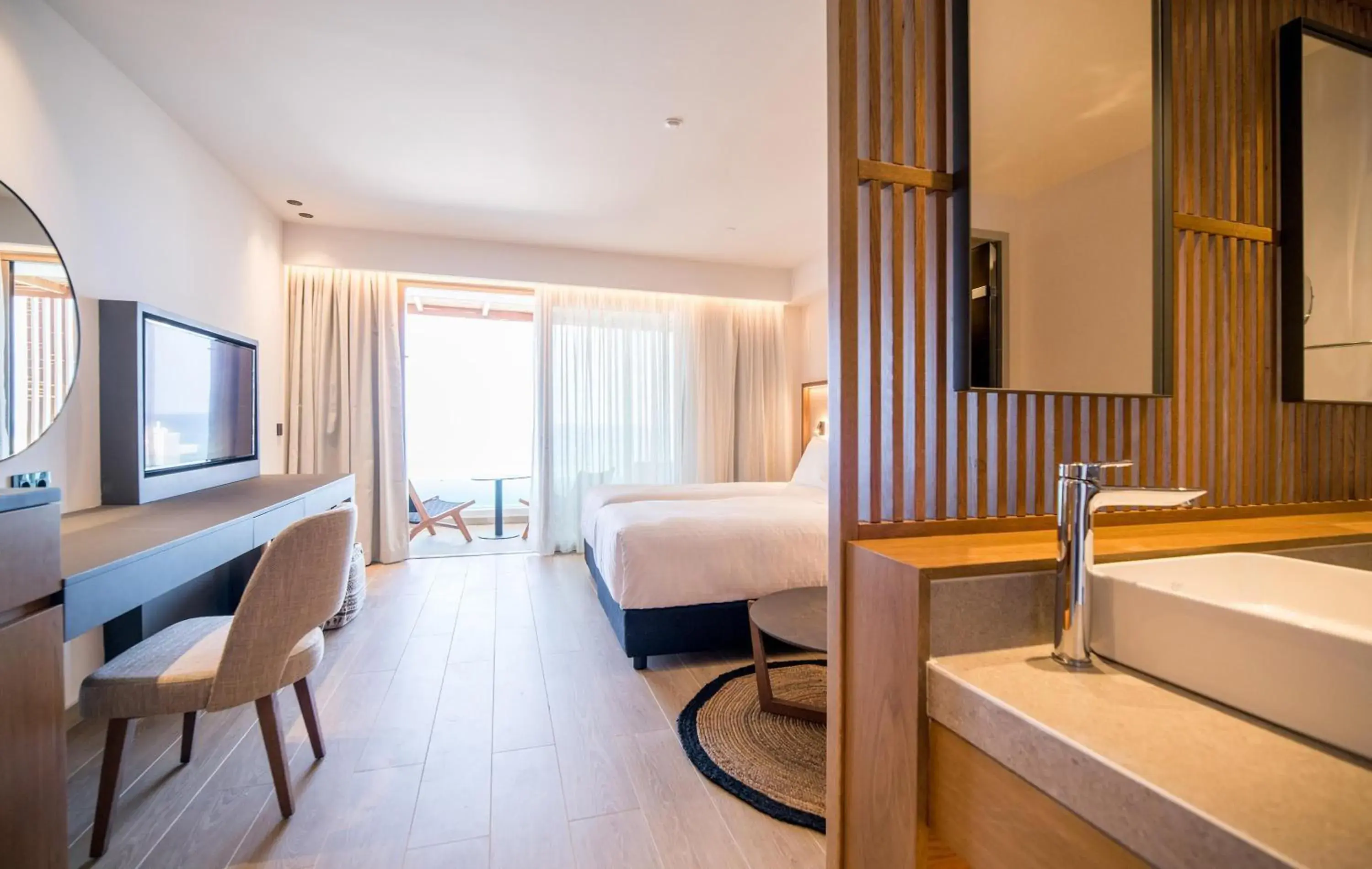 Photo of the whole room, Bed in AKASHA Beach Hotel & Spa Photo of the whole room, Bed in AKASHA Beach Hotel & Spa