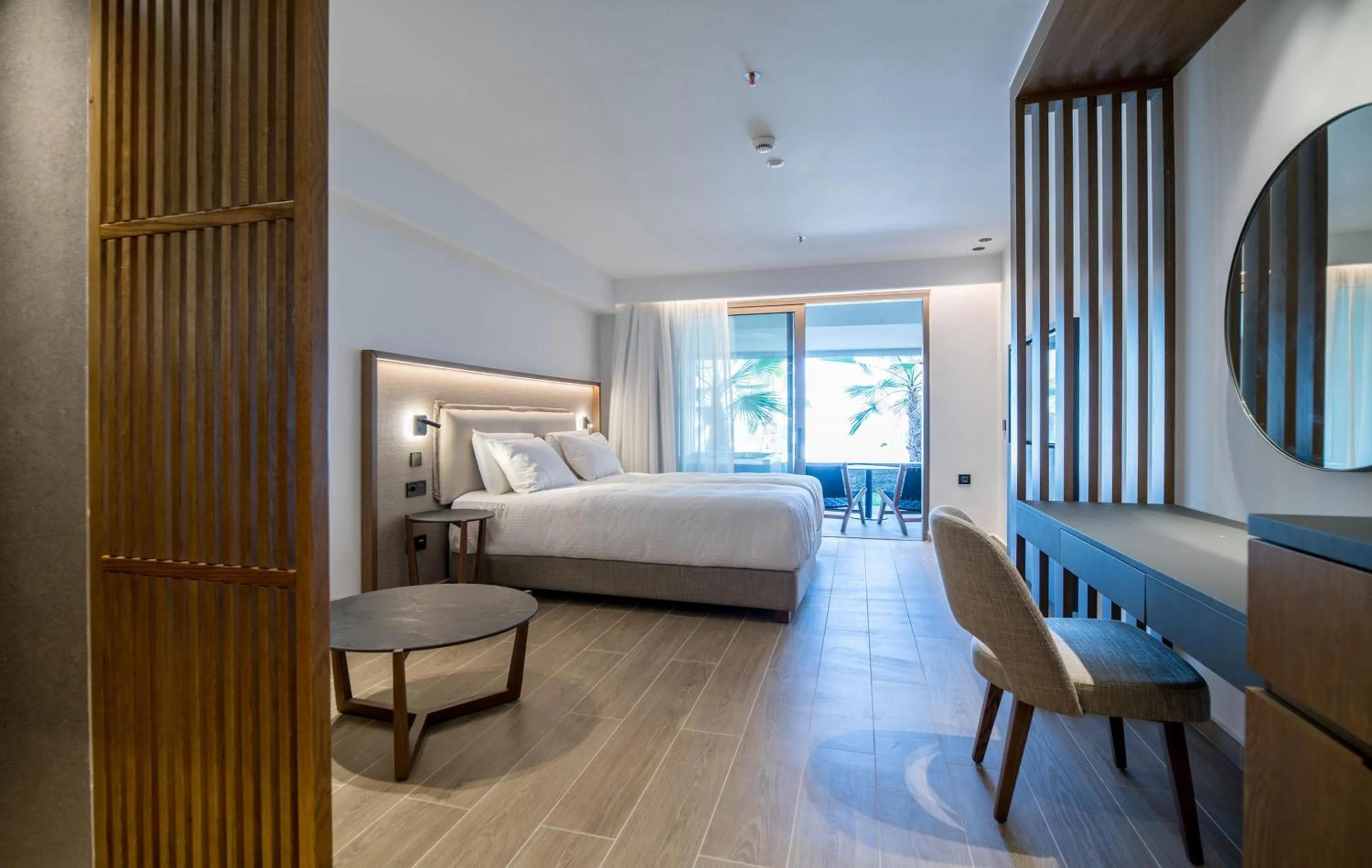 Photo of the whole room, Bed in AKASHA Beach Hotel & Spa