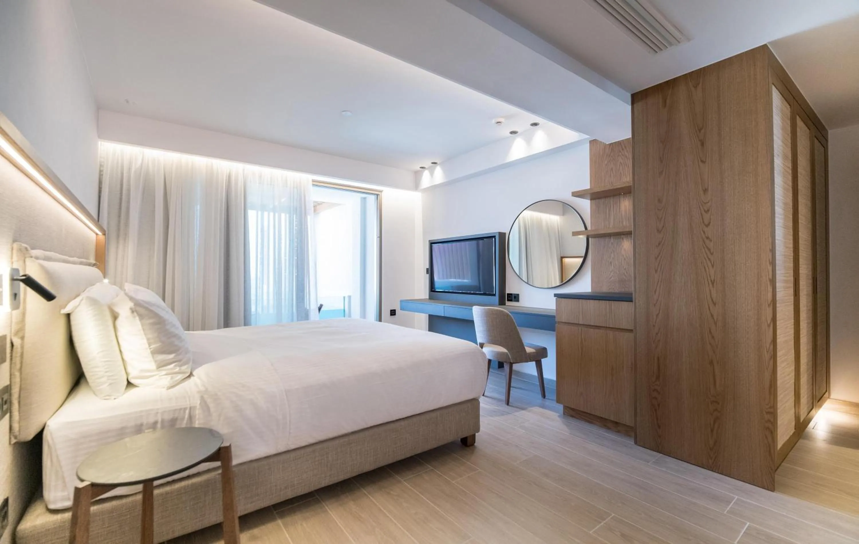 Photo of the whole room, Bed in AKASHA Beach Hotel & Spa