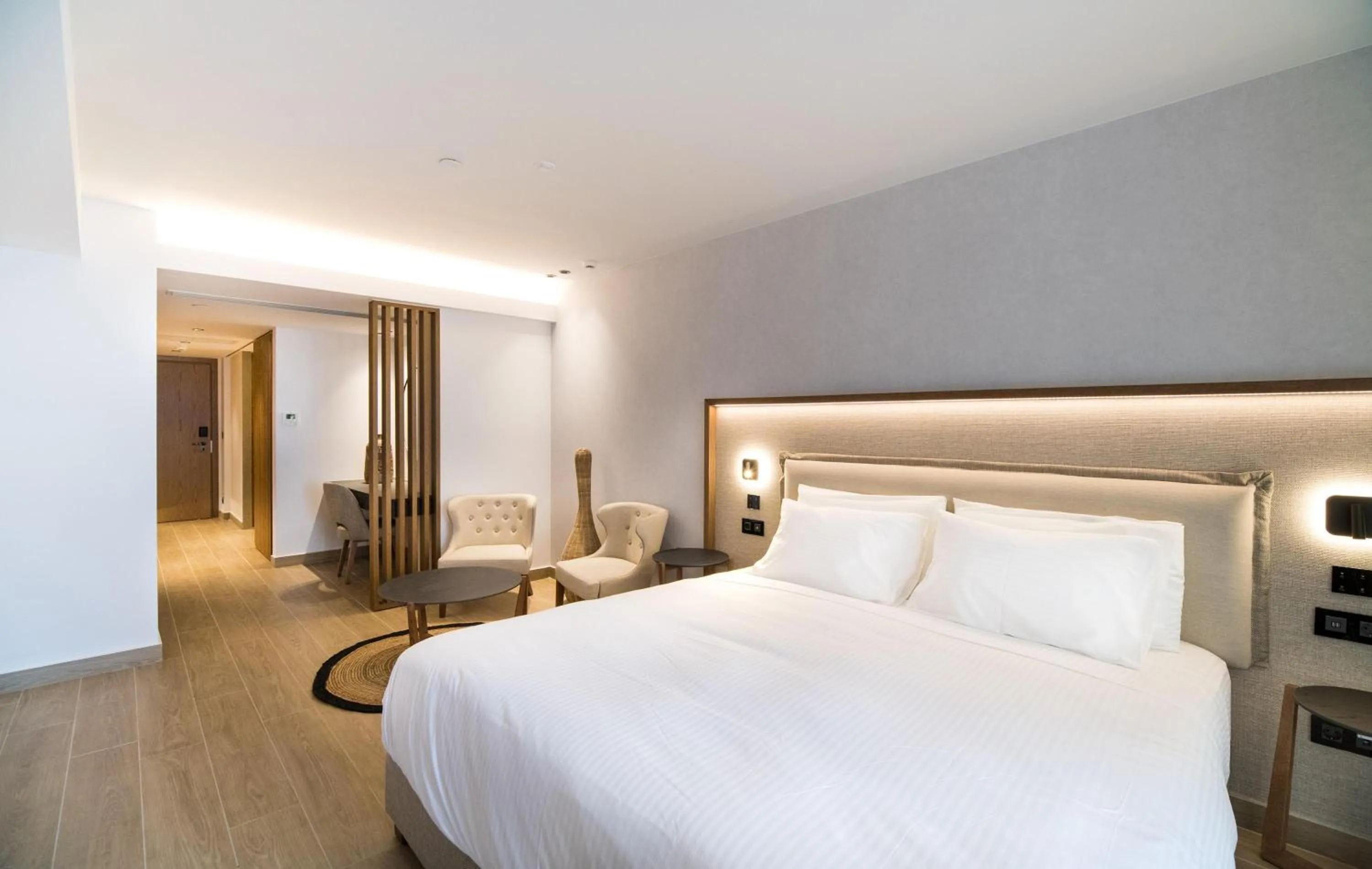 Photo of the whole room, Bed in AKASHA Beach Hotel & Spa