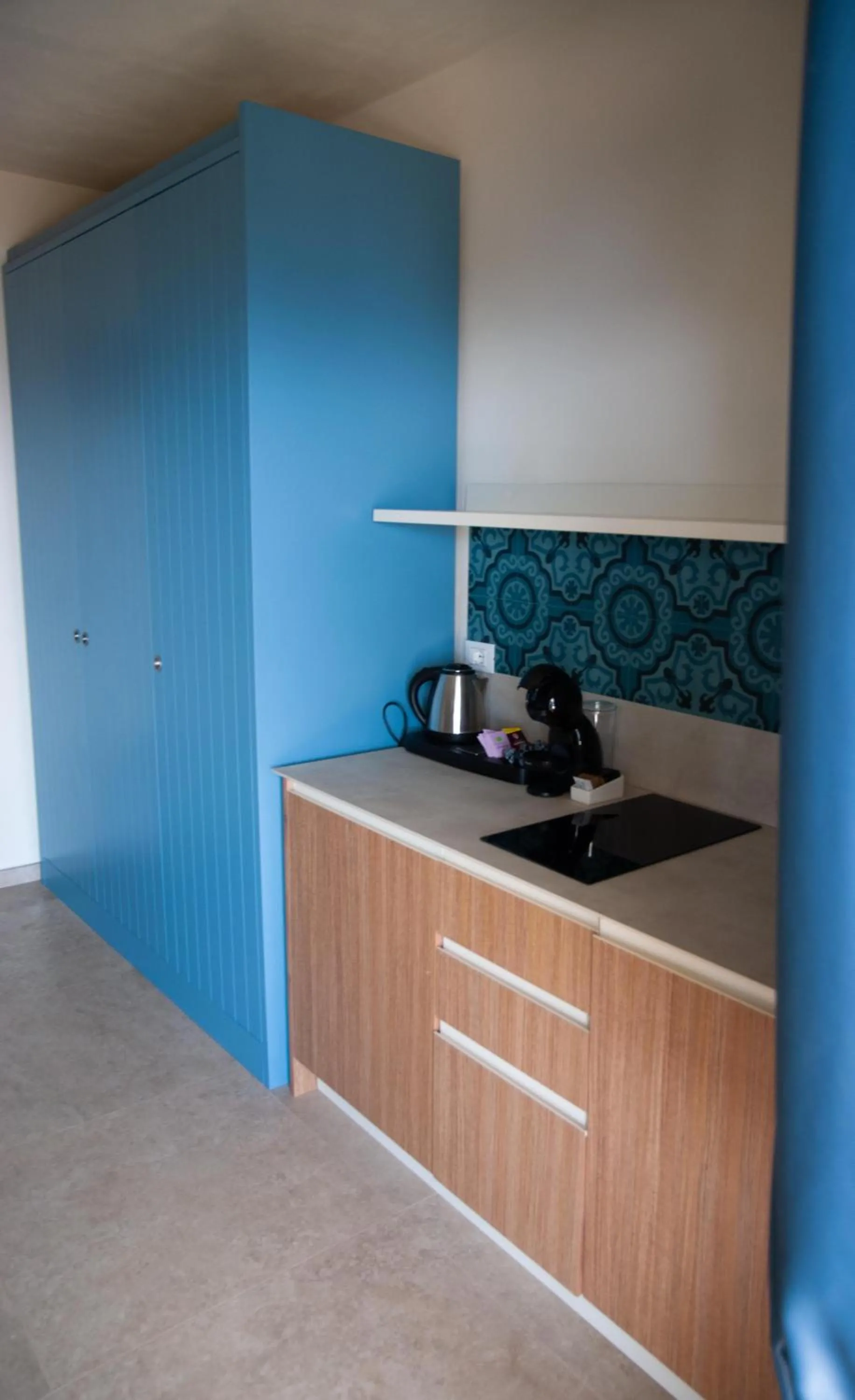 Kitchen or kitchenette in Resort Capo Bianco
