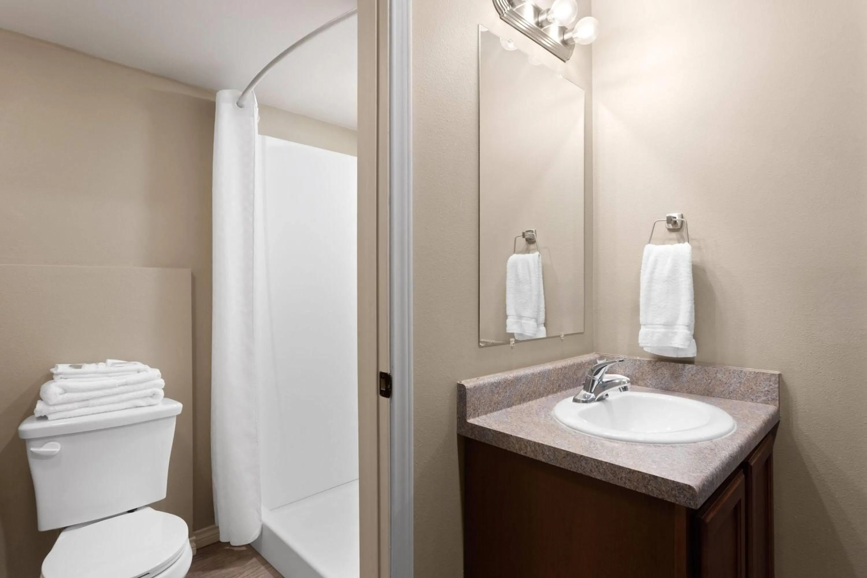 Bathroom in Eagle's Den Suites Andrews a Travelodge by Wyndham